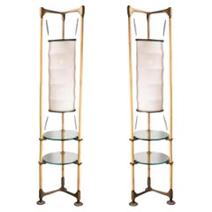 Pair of bamboo and leather floor lamps by Ronald Cecil Sportes