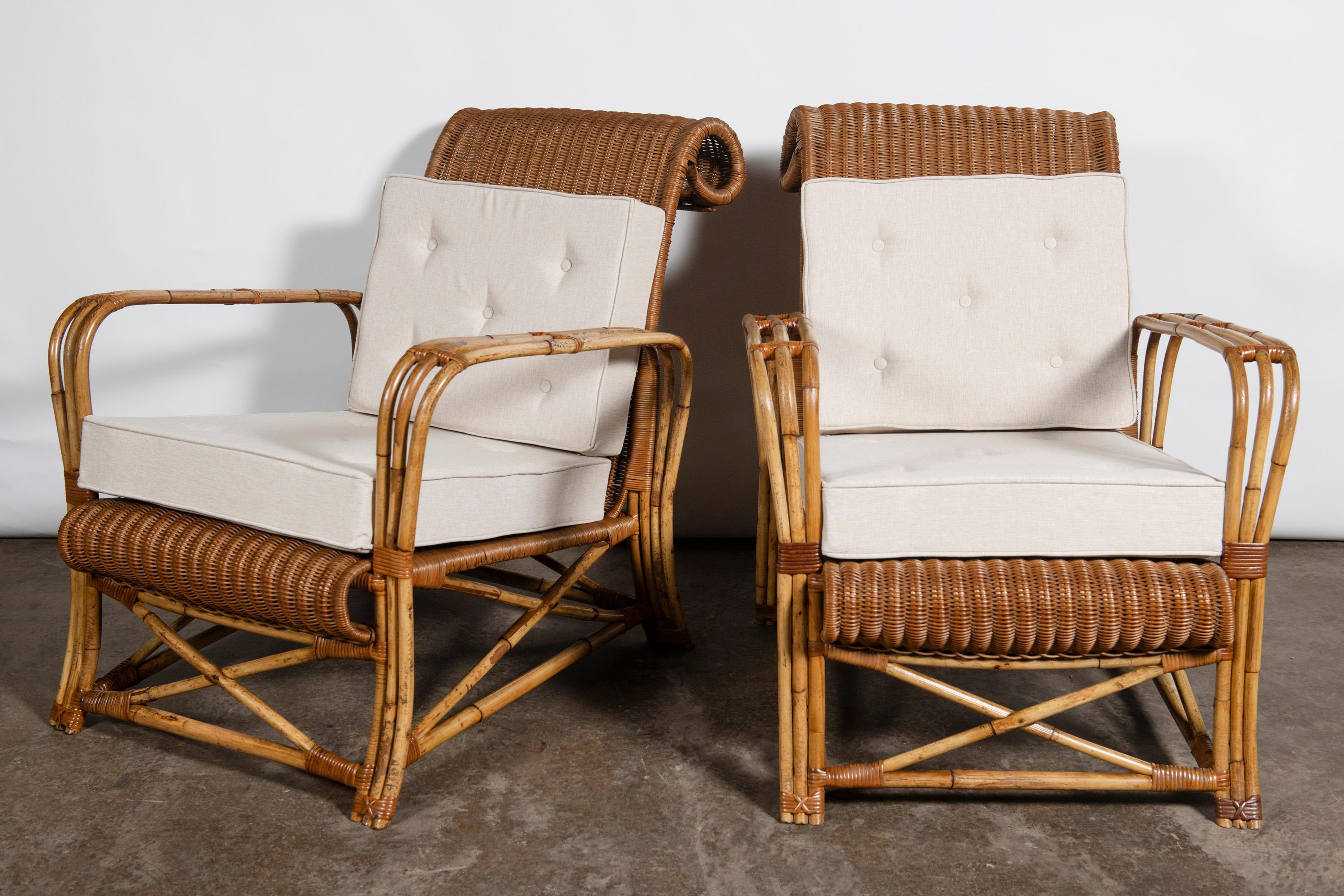 Art Déco Coppia di poltrone in bambù e rattan con cuscini in tessuto, Inghilterra, circa 1920. in vendita