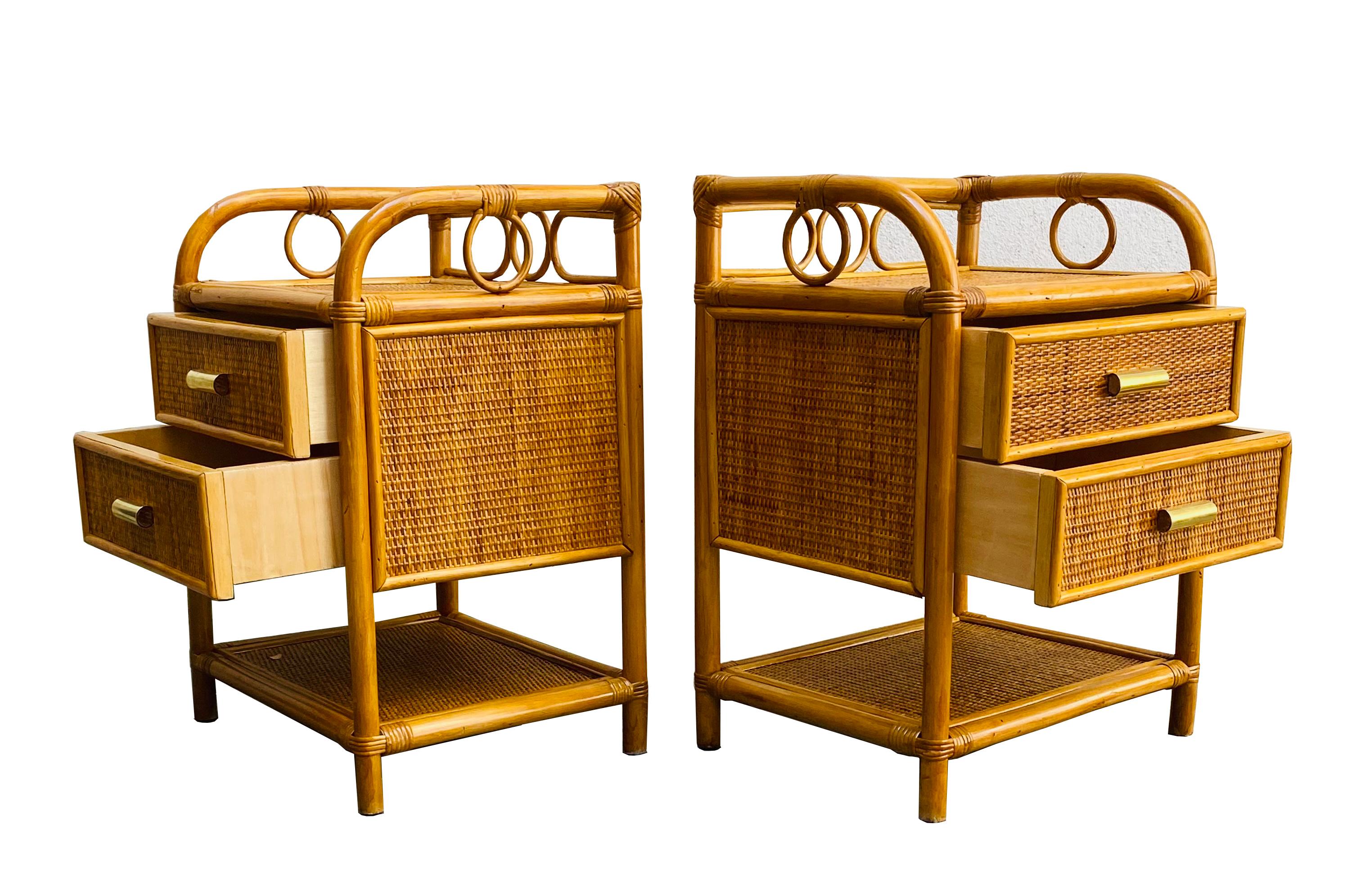 Pair of Italian bamboo cane and rattan bedside tables designed in the 1970s. The main features of this wonderful set are the beautiful straight rationalist lines, enhanced by the use of natural materials, such as bamboo for the frame, rattan for the