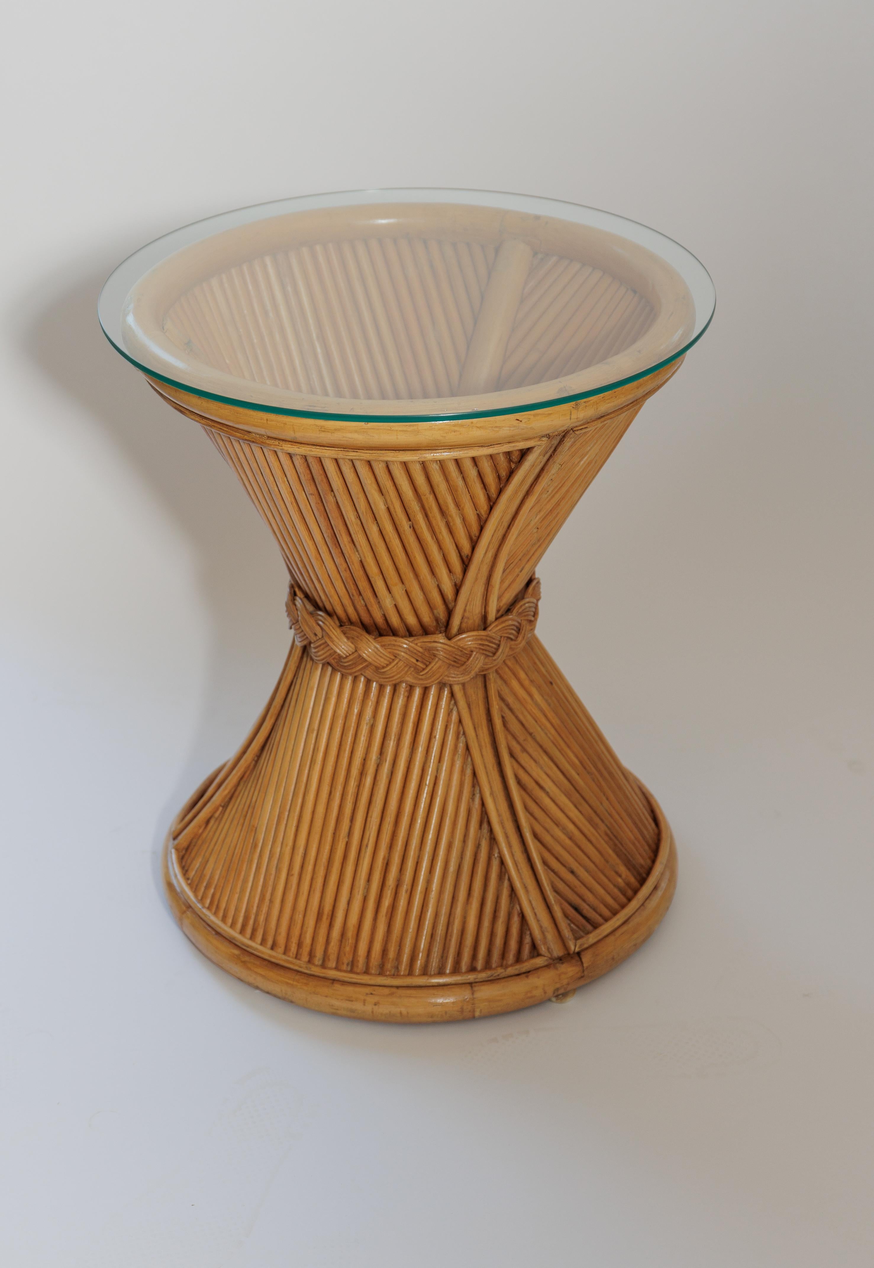 Pair of bamboo side tables with glass tops.  Featuring fluting and braid detailing.
