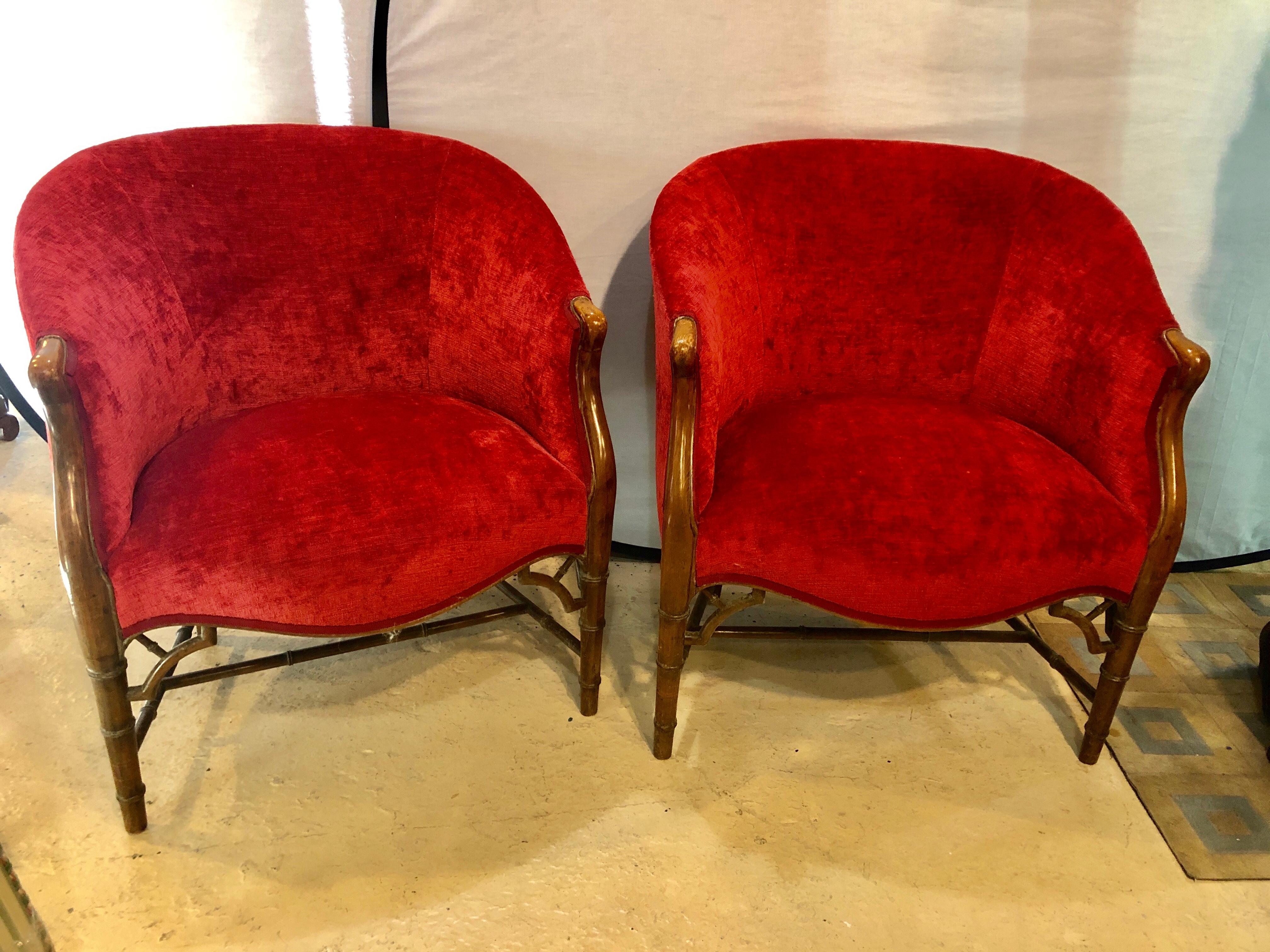 Pair of bamboo legged cherry red velour 19th-20th century barrel back chairs. Sleek and stylish are this Fine pair of custom quality designer armchairs in a walnut wood frame. Strong, sturdy and comfortable.