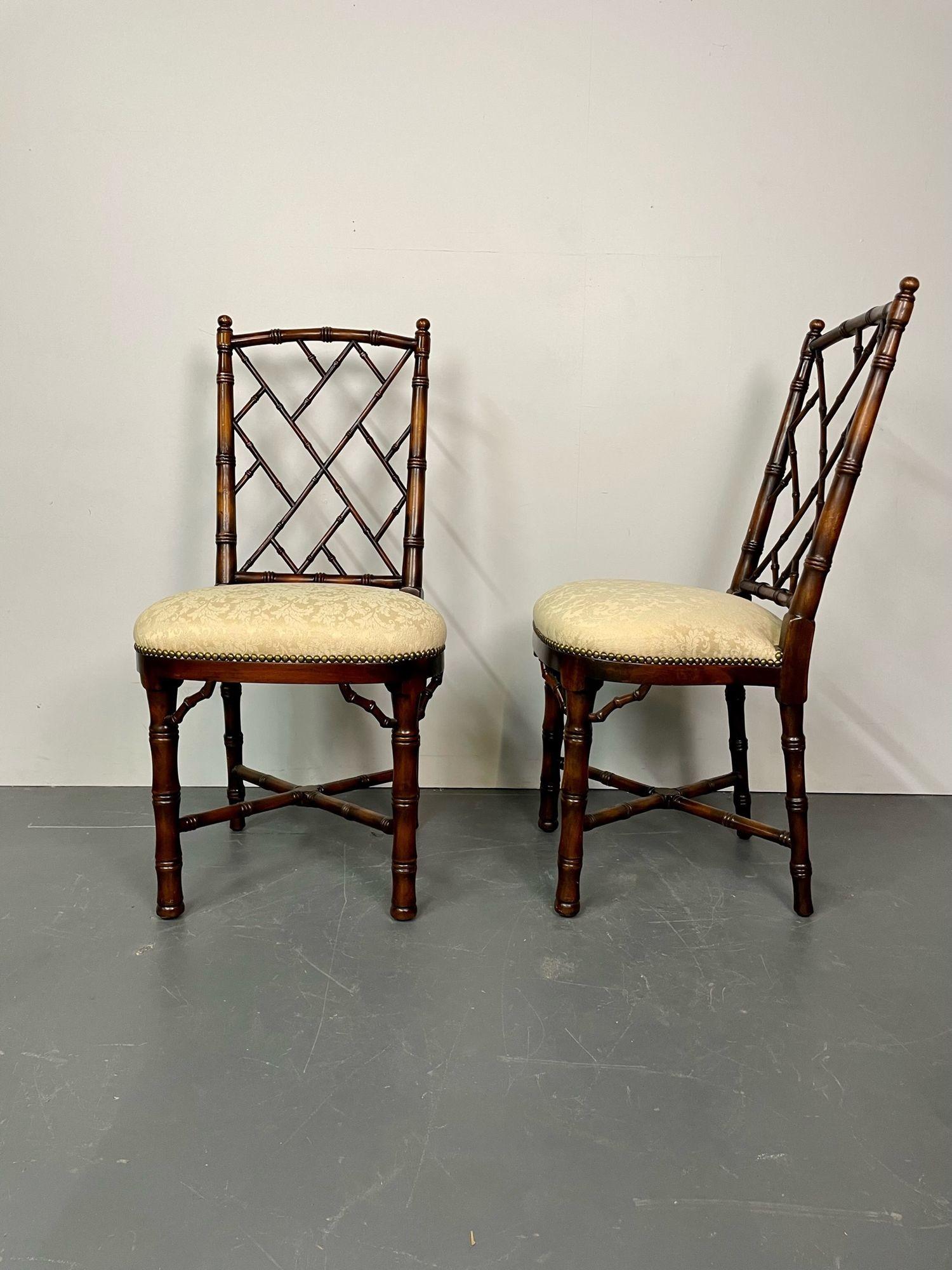 Pair, wooden side or desk chairs with bamboo detailing, damask upholstery & brass tack detailing
Each having wonderfully decorative X form slat backs on padded seats leading to an X base undercarriage. The pair with heavy padded seats. 
Measures: