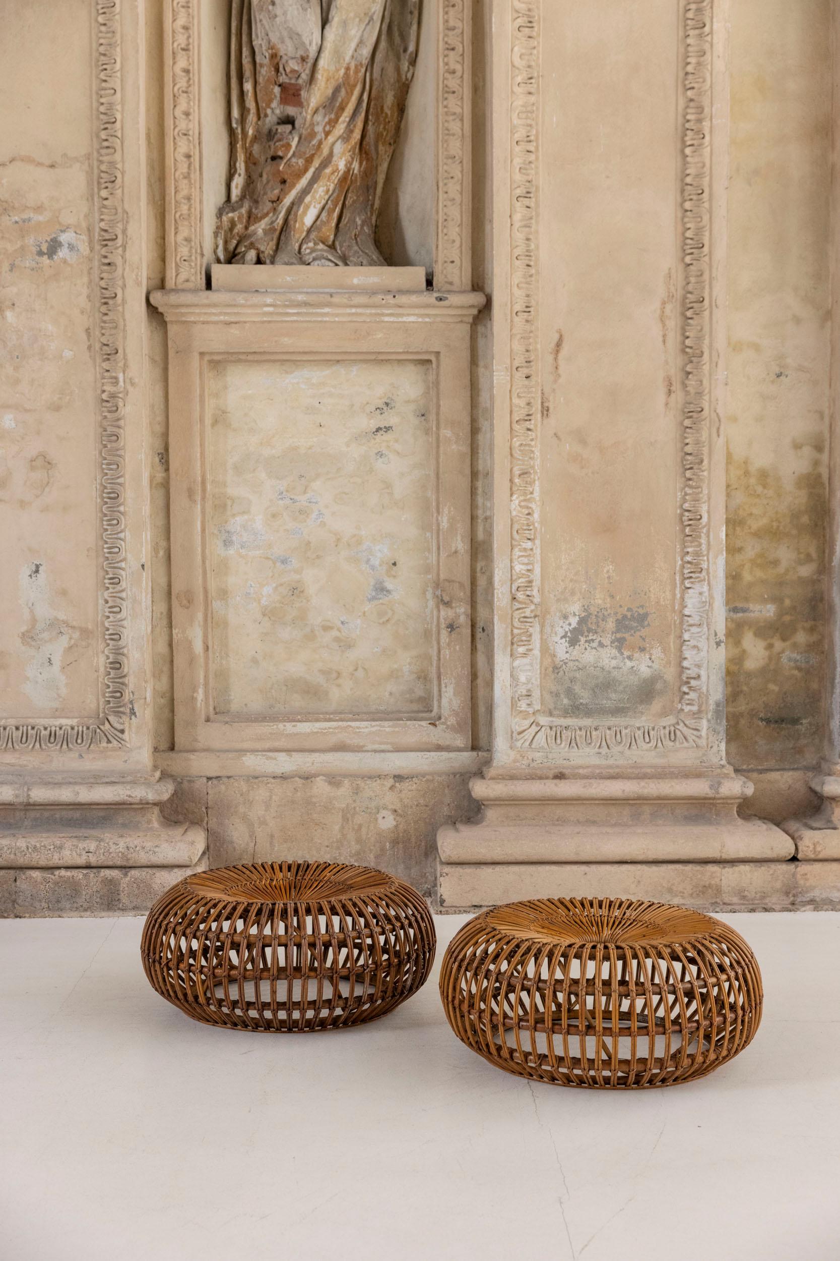 A beautiful pair of mid-century bamboo stools designed by the renowned Italian designer Ico Parisi for Bonacina. These stools are crafted from natural bamboo with woven rattan seating, highlighting Parisi’s skill in combining elegance with