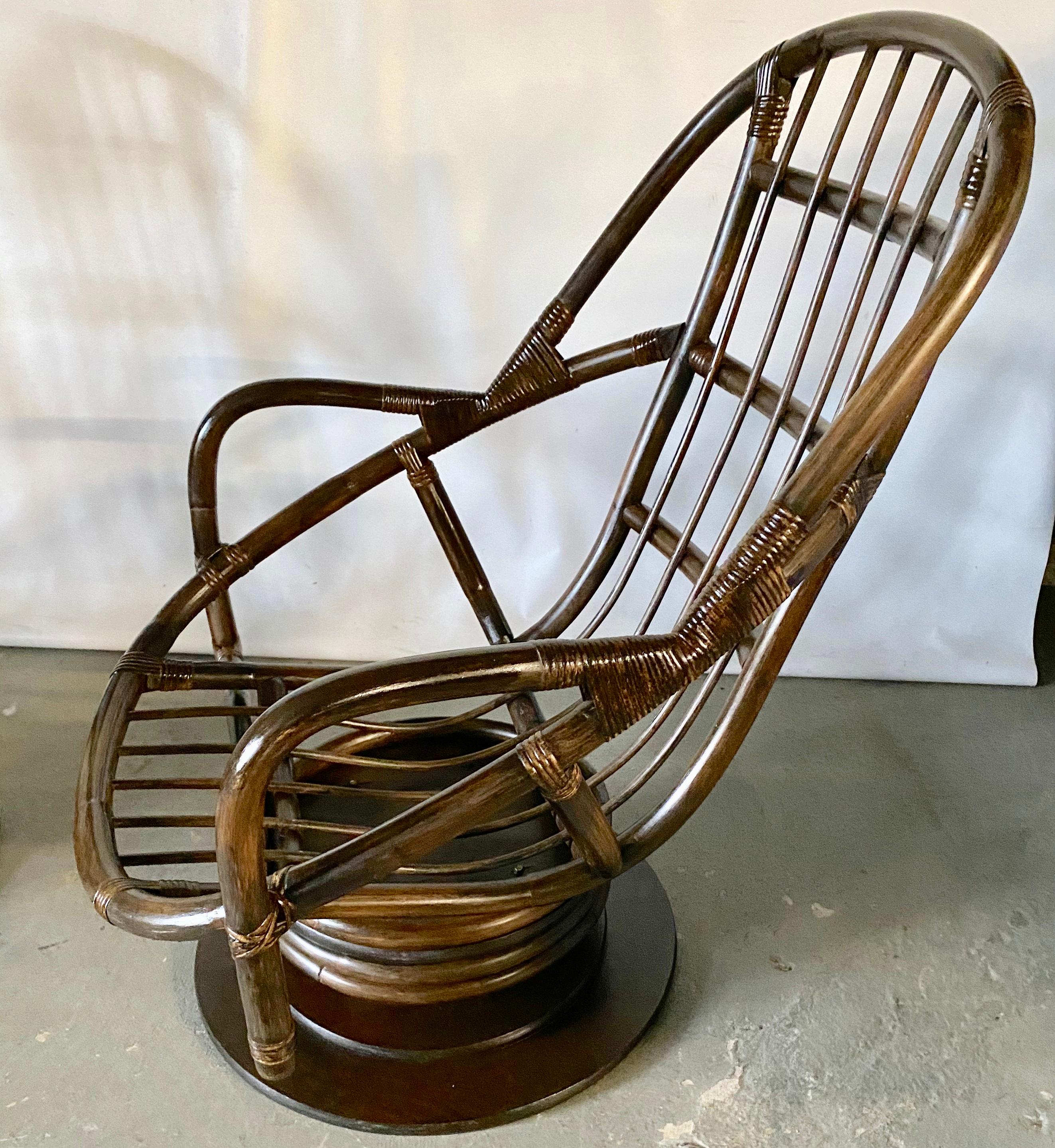 Pair of very comfortable and elegant bamboo lounge chairs with bucket shape seats. These chairs have a dark stain with a wonderful swivel motion to make them welcoming and comfortable to relax in. They will work well in any decor or setting.
Search