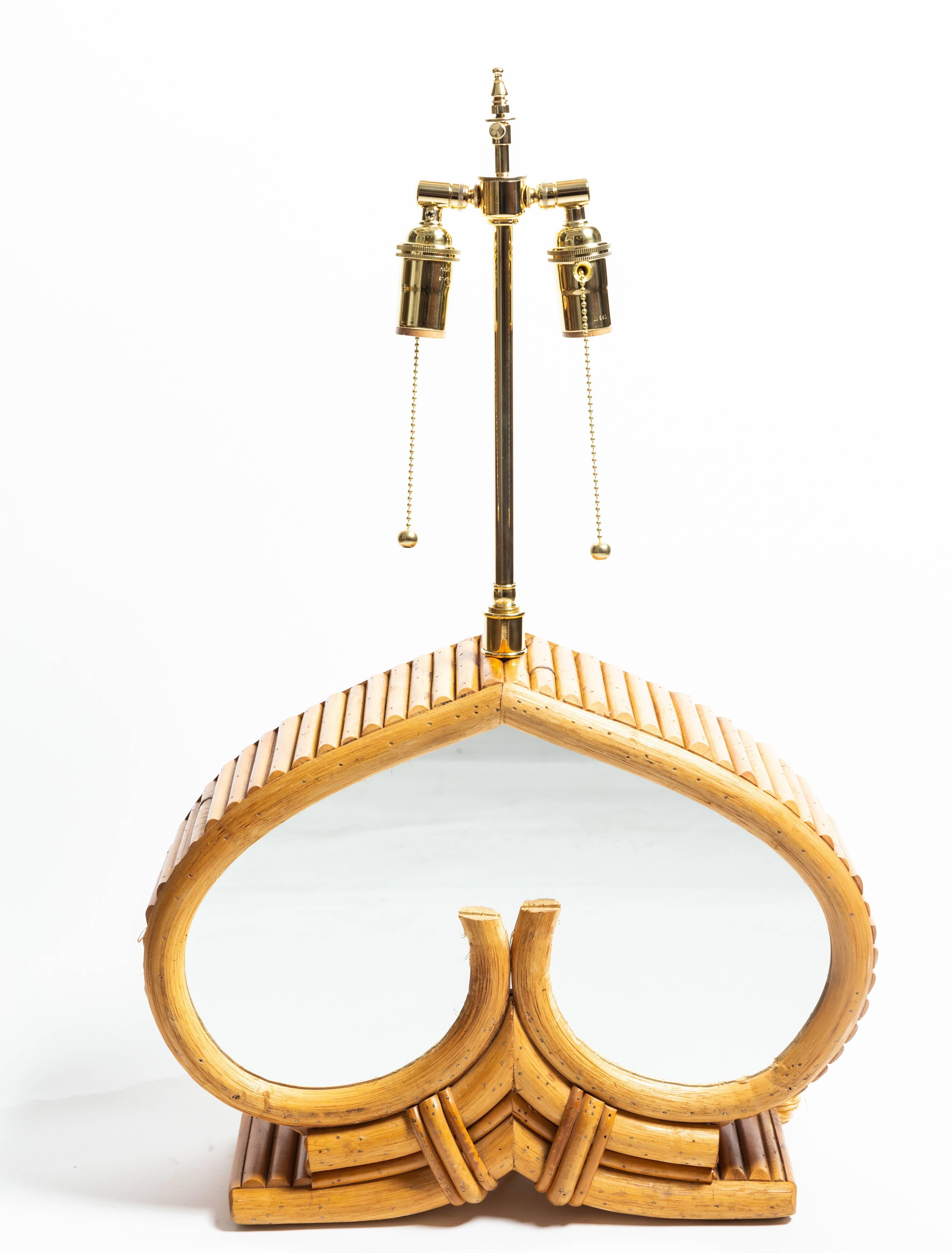 Pair of bamboo table lamps with mirrored glass detail.