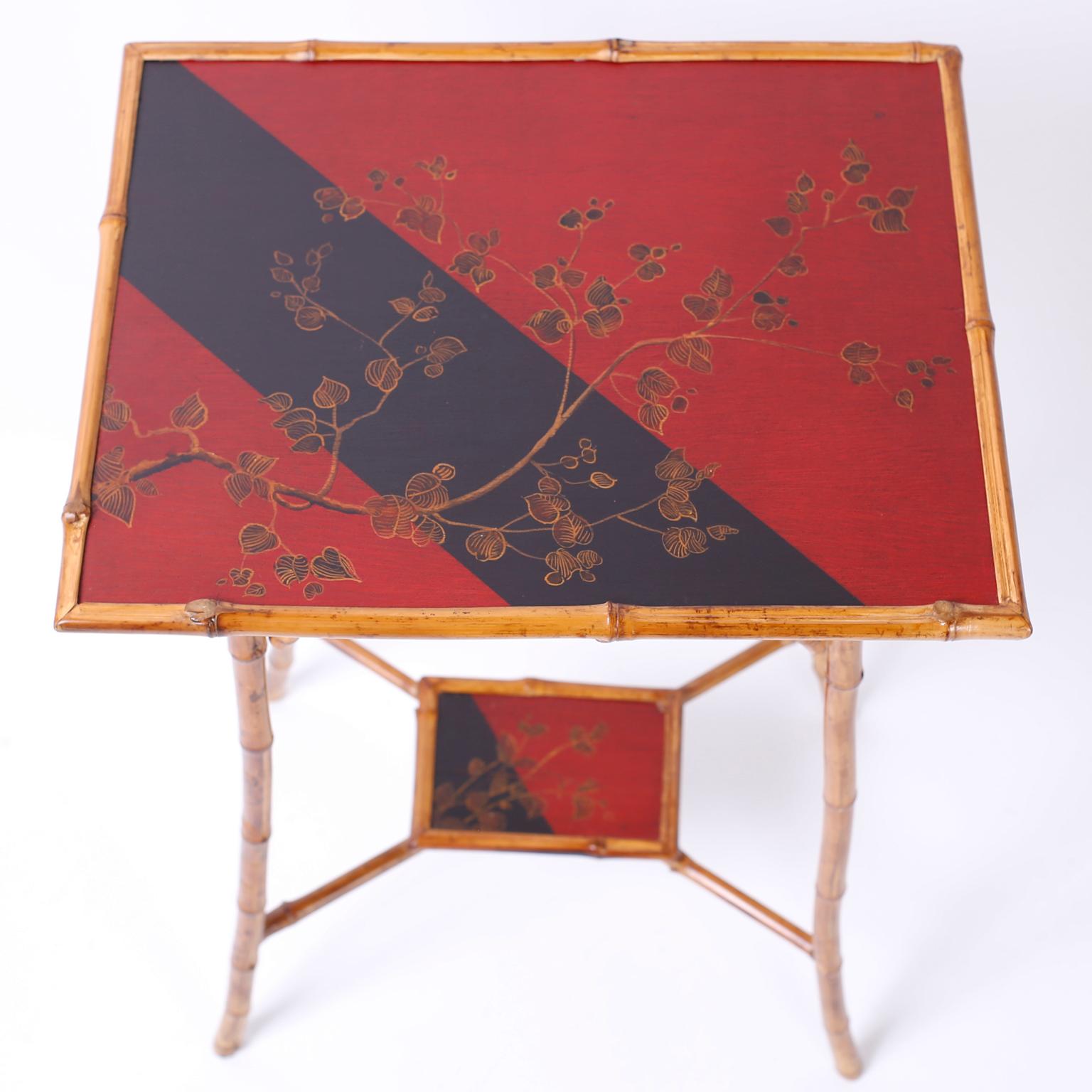 Chinoiserie Pair of Bamboo Tables with Red and Black Lacquer Motif For Sale