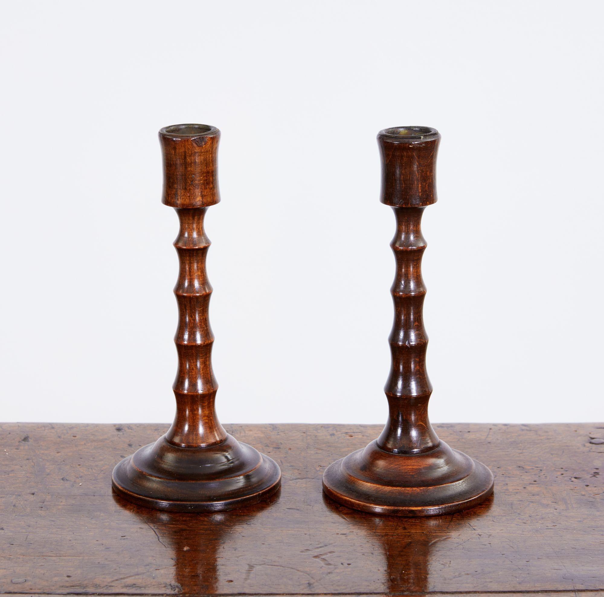 Pair of English early 20th Century bamboo turned beechwood candlesticks having good rich color and patination.

treen