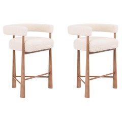 Pair of bar stools in blond beech. Contemporary work.