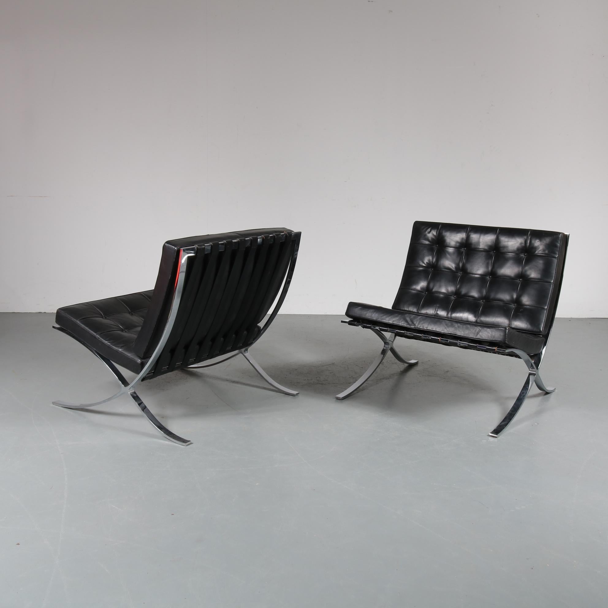 A beautiful pair of Barcelona chairs, designed by Mies van der Rohe in 1929, manufactured by Knoll International in the USA around 1970.

These beautiful chairs are upholstered in black leather leather, giving them an extra sense of luxury. The