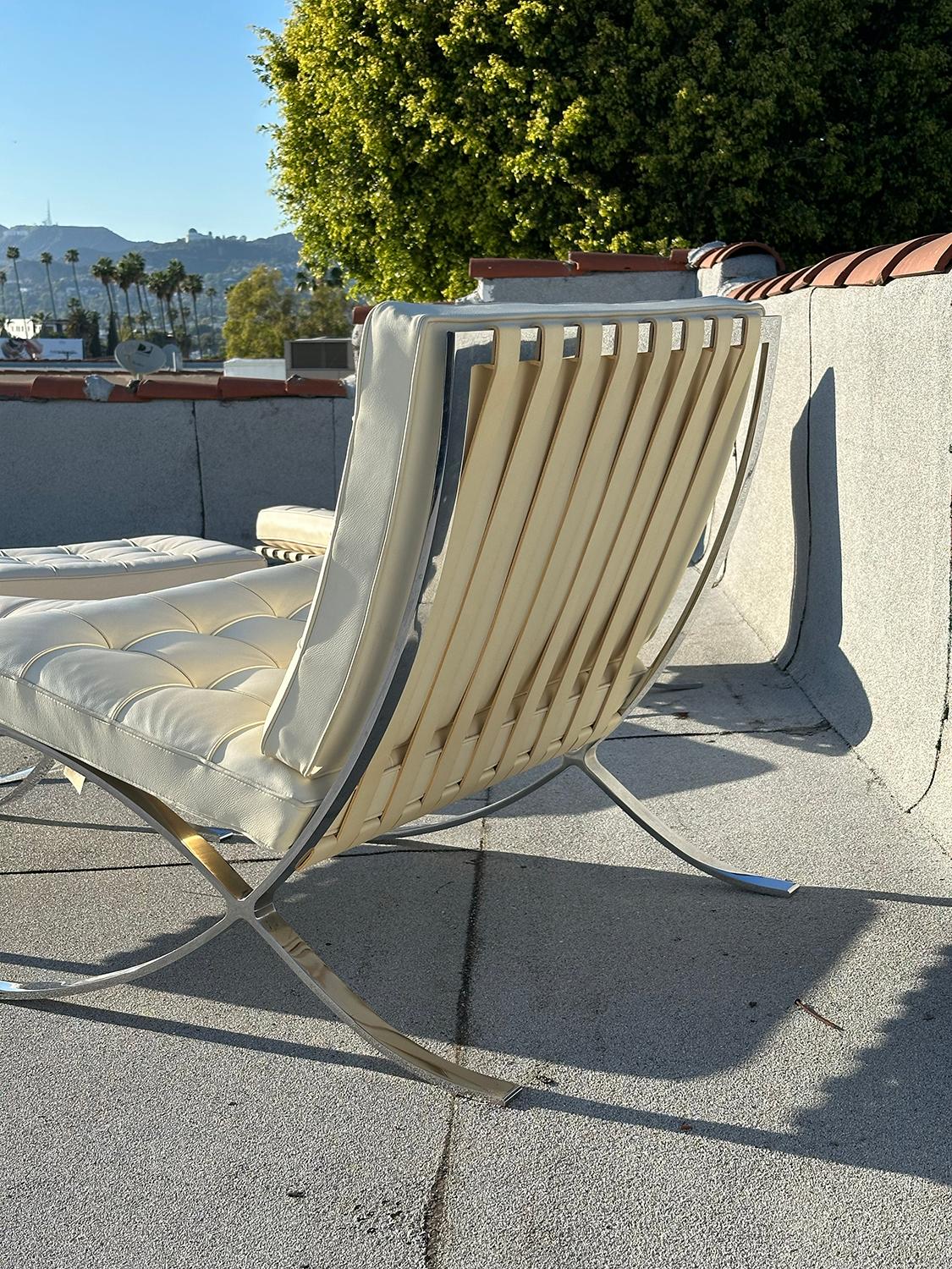Steel Pair of Barcelona Chairs with Otttomans For Sale
