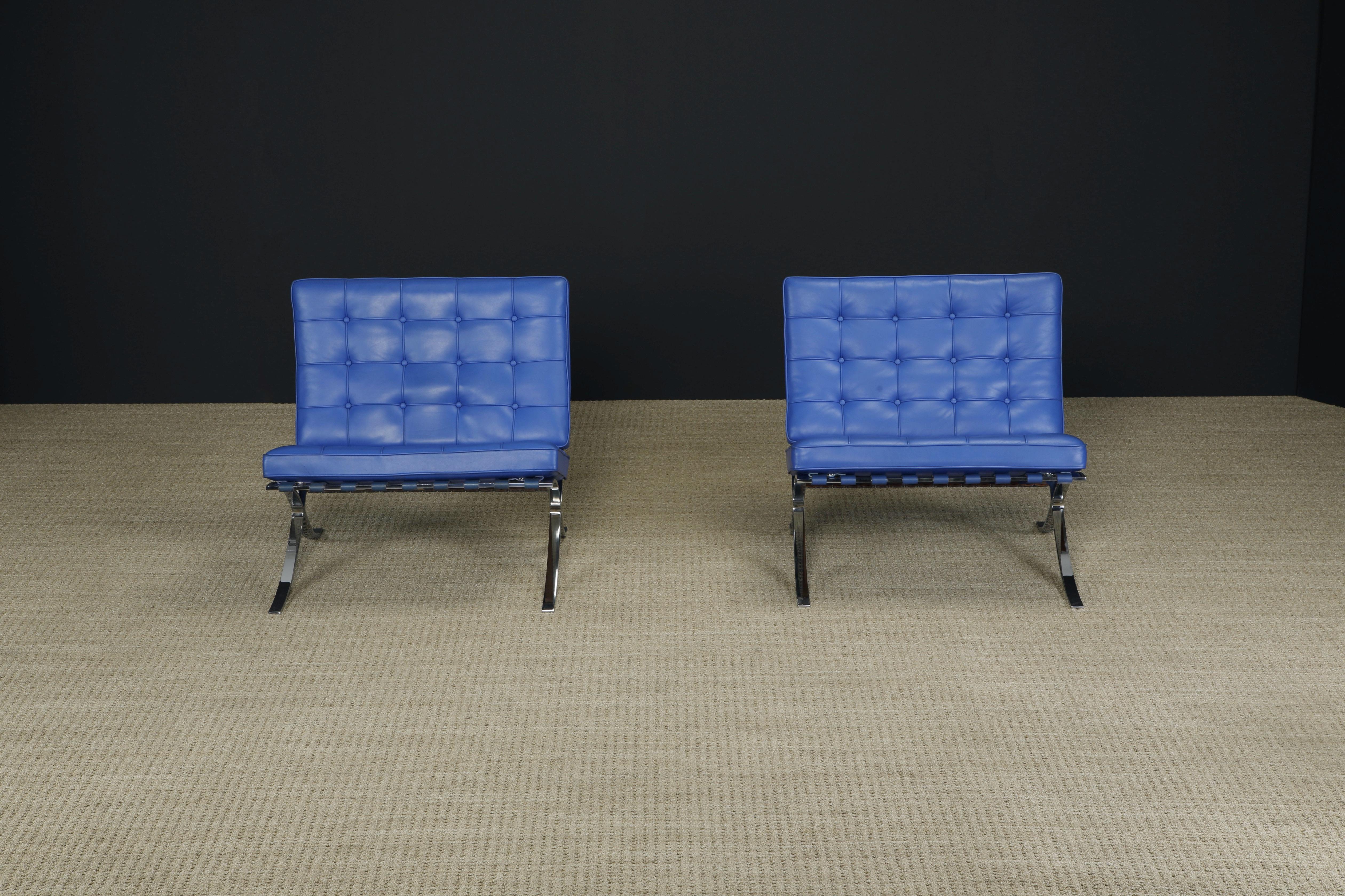 This pair of gorgeous blue leather 'Barcelona' lounge chairs by Ludwig Mies van der Rohe for Knoll Studios is double-signed on each piece, with Knoll Inc labels to the seat cushions and Knoll Studio embossing with Mies van der Rohe signatures