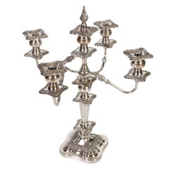 Coppia di candelabri barocchi a cinque bracci con peso in argento