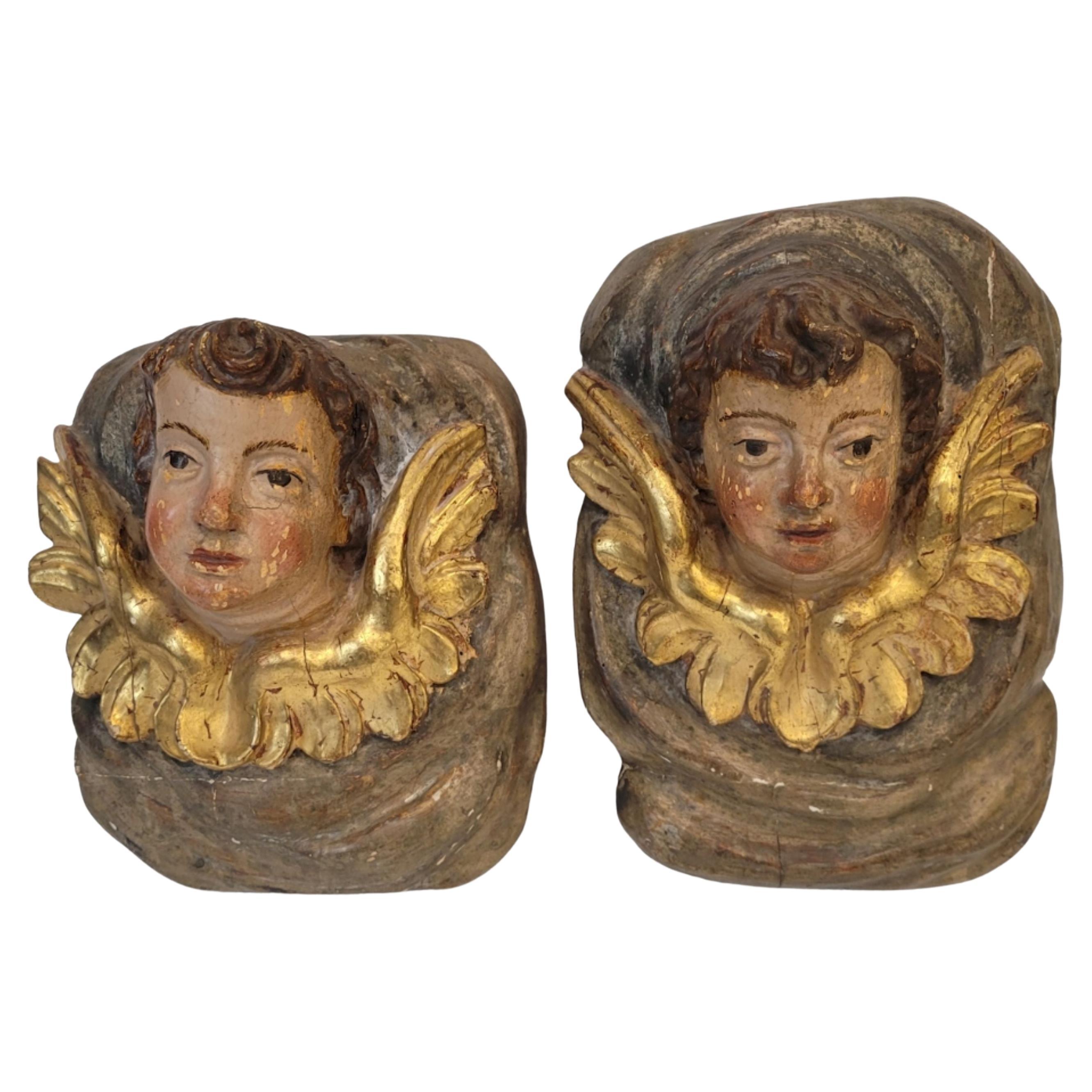 Pair of Baroque high reliefs of Angels, Cherubs, polychrome and gilded wood in vendita
