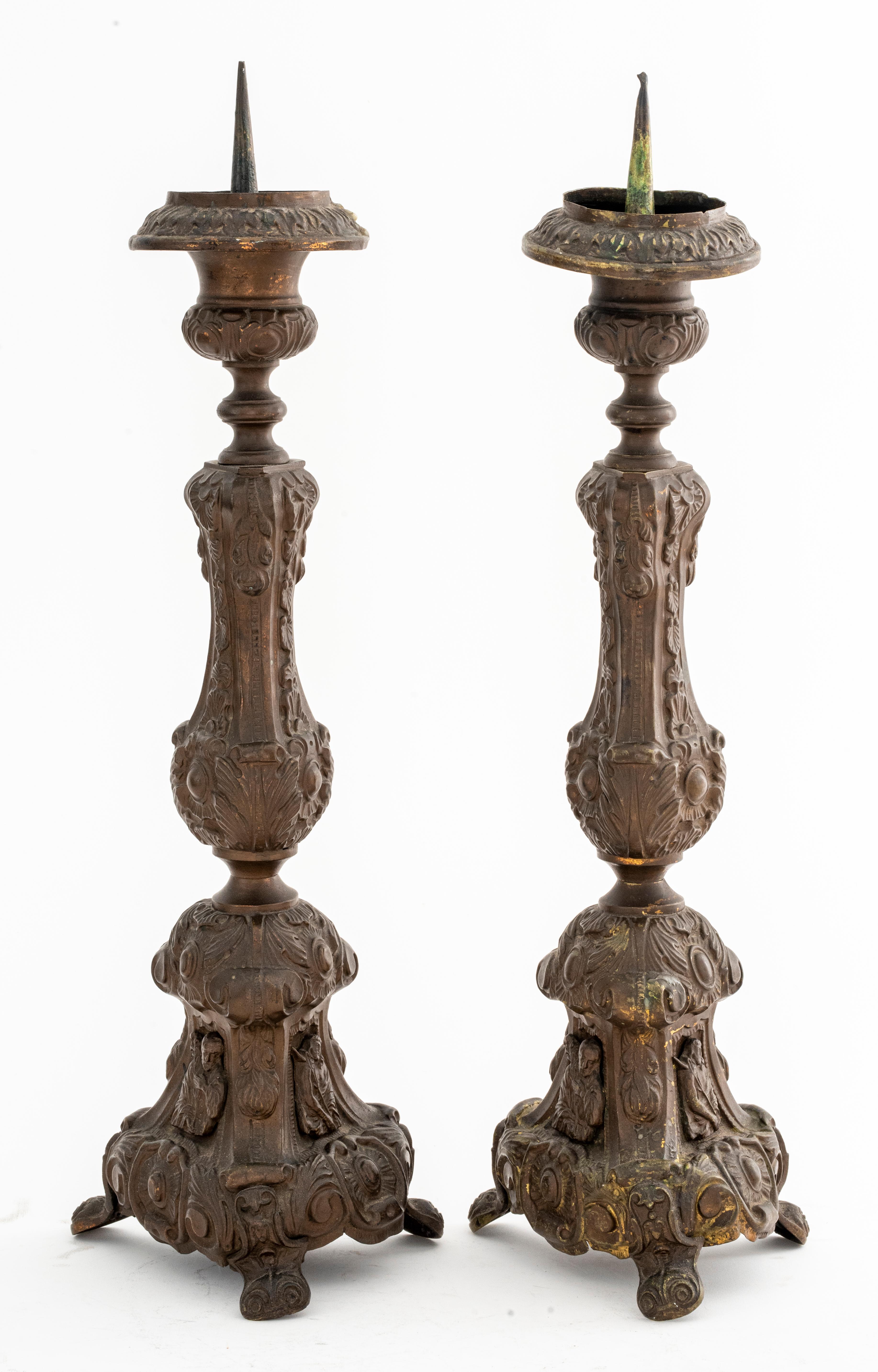 Baroque Revival pair of repousse brass candle pricks.