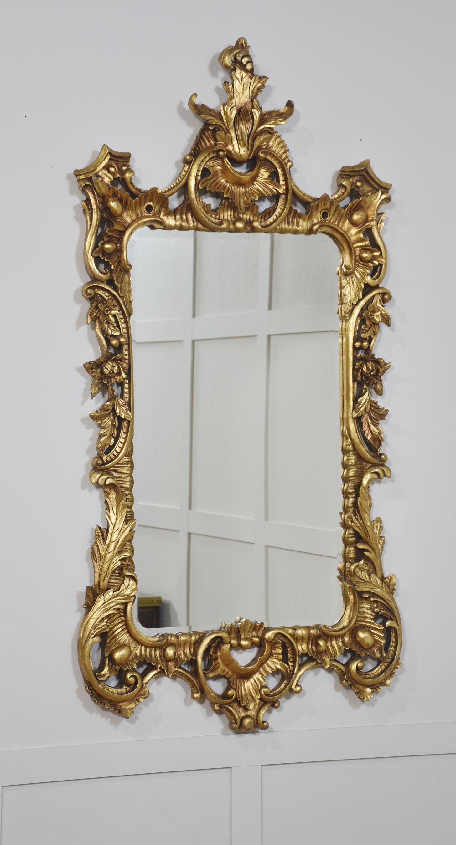 British Pair of baroque style carved and gilded mirrors For Sale