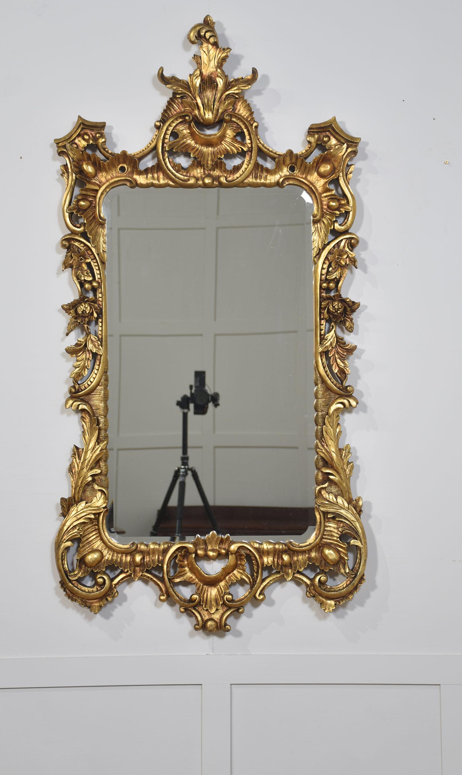 Pair of baroque style carved and gilded mirrors For Sale 1