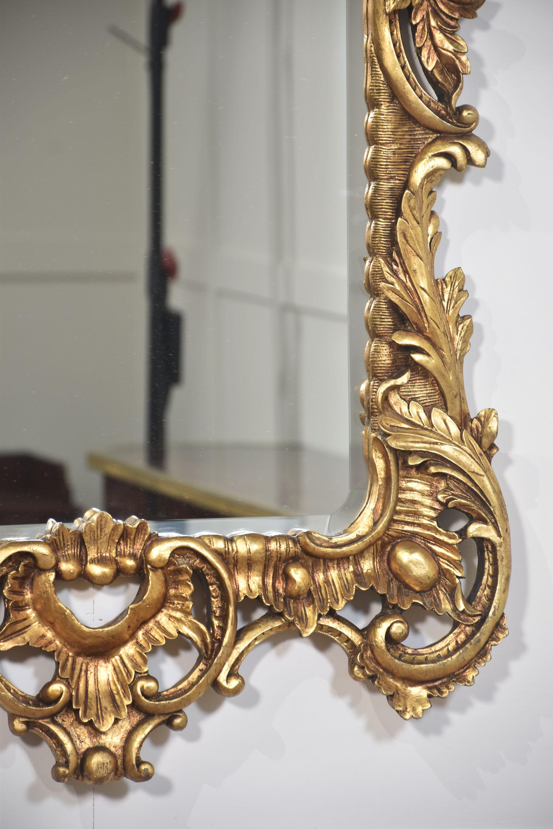Pair of baroque style carved and gilded mirrors For Sale 2