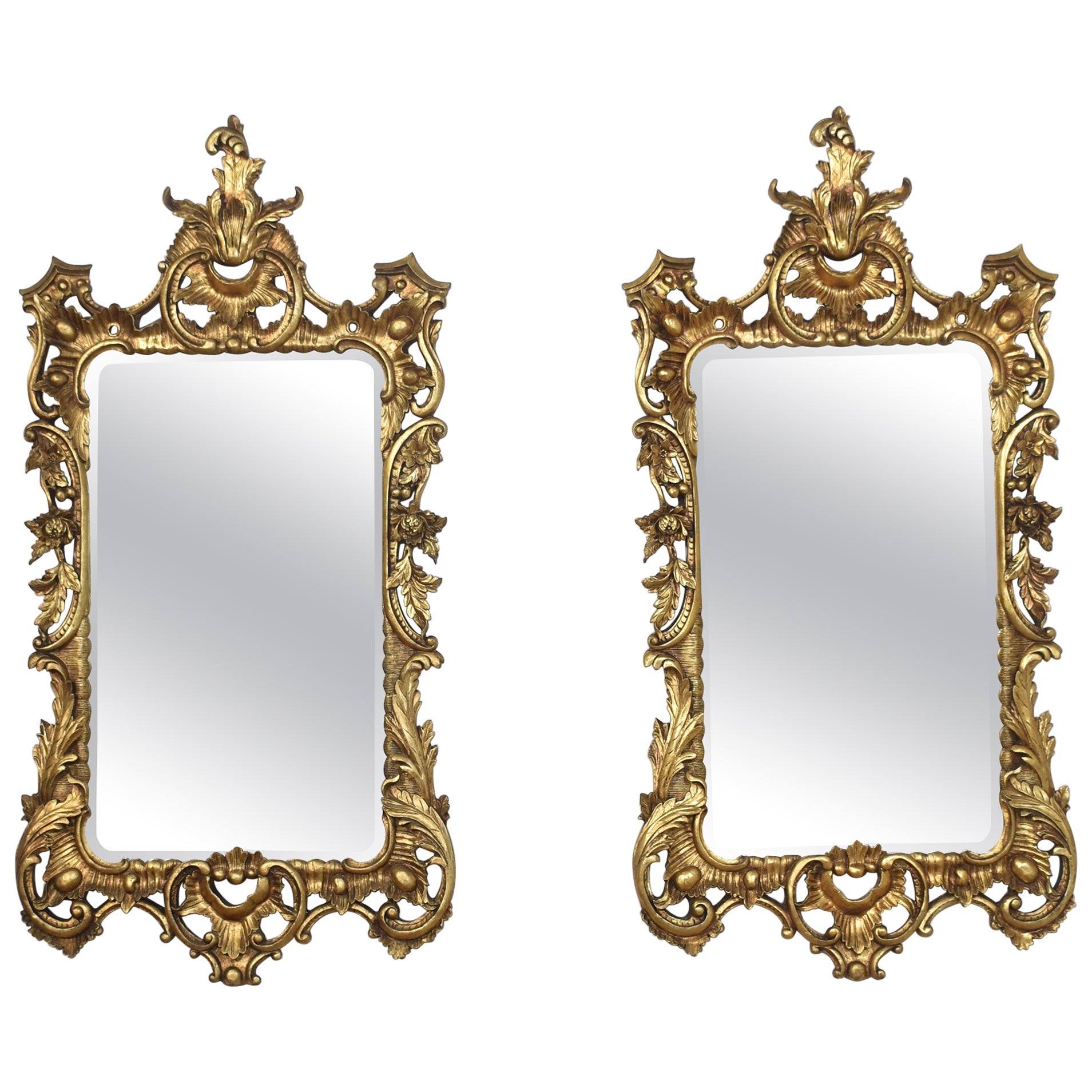 Pair of baroque style carved and gilded mirrors For Sale