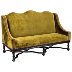 Pair of Baroque Style Ebonized and Upholstered Sofas