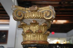 Pair of Baroque Style Spiral Carved Parcel Gilt and Faux Marble Columns