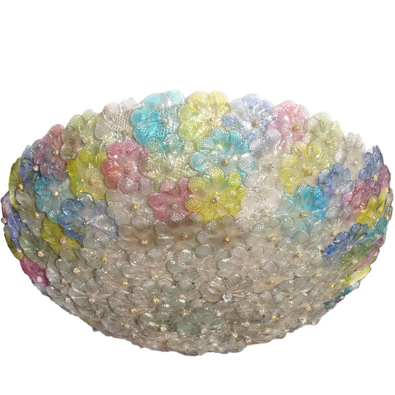 This amazing pair of basket is made of dozen of precious Murano multi-color flower glasses.
6 x E 14 light bulbs.
Available also a pair of sconces.
 