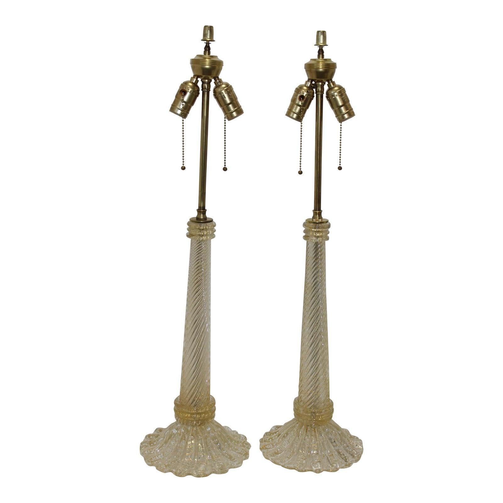 This stylish pair of Barovier & Toso Murano glass table lamps date to the 1920s-1930s . The pieces are infused with gold particles that catch the light beautifully.

Note: The piece have been professionally rewired with new sockets and silk