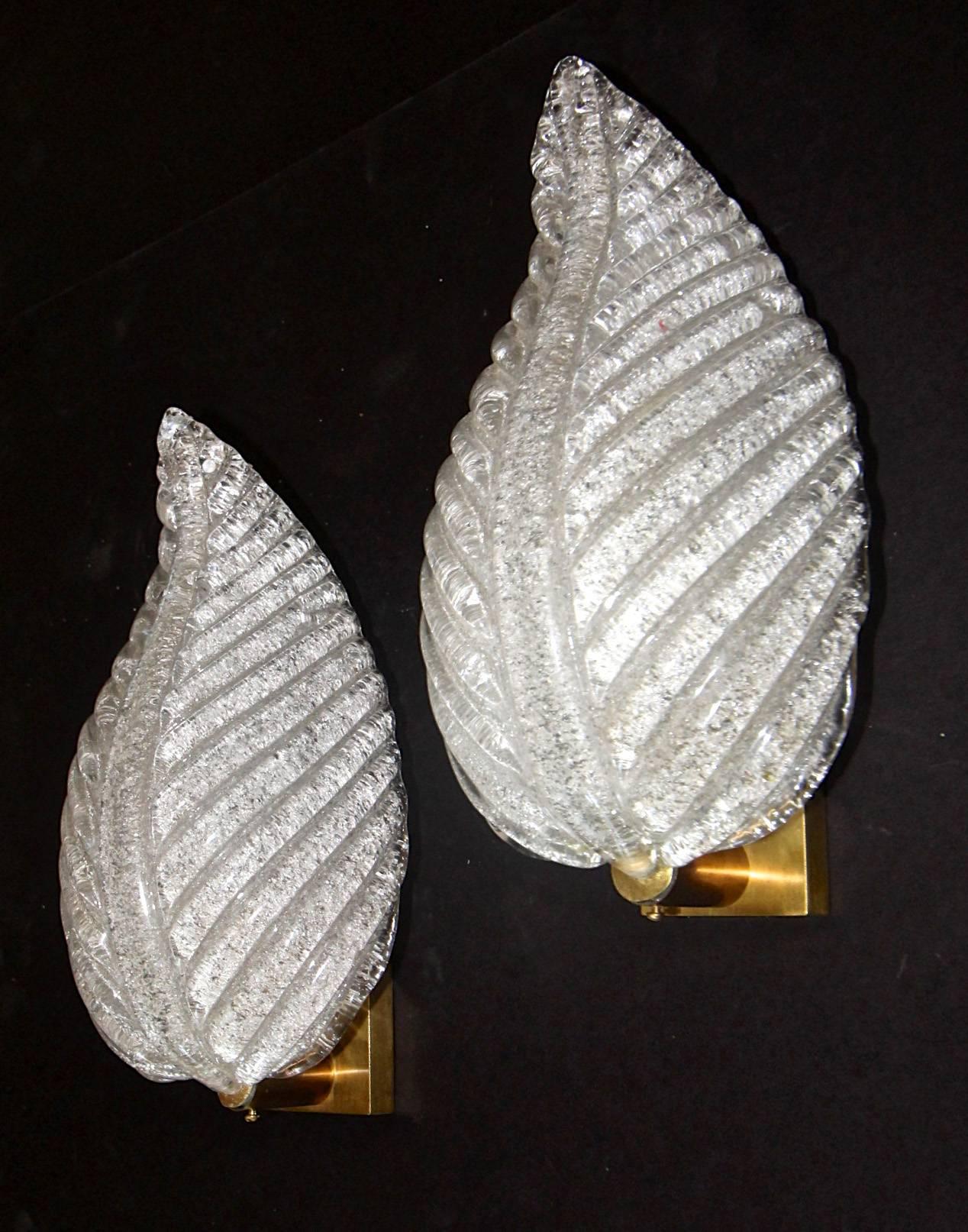 Pair of beautiful handblown Barovier glass leaf wall sconces, supported on brass backplates. Reverse side of the leaf in the 