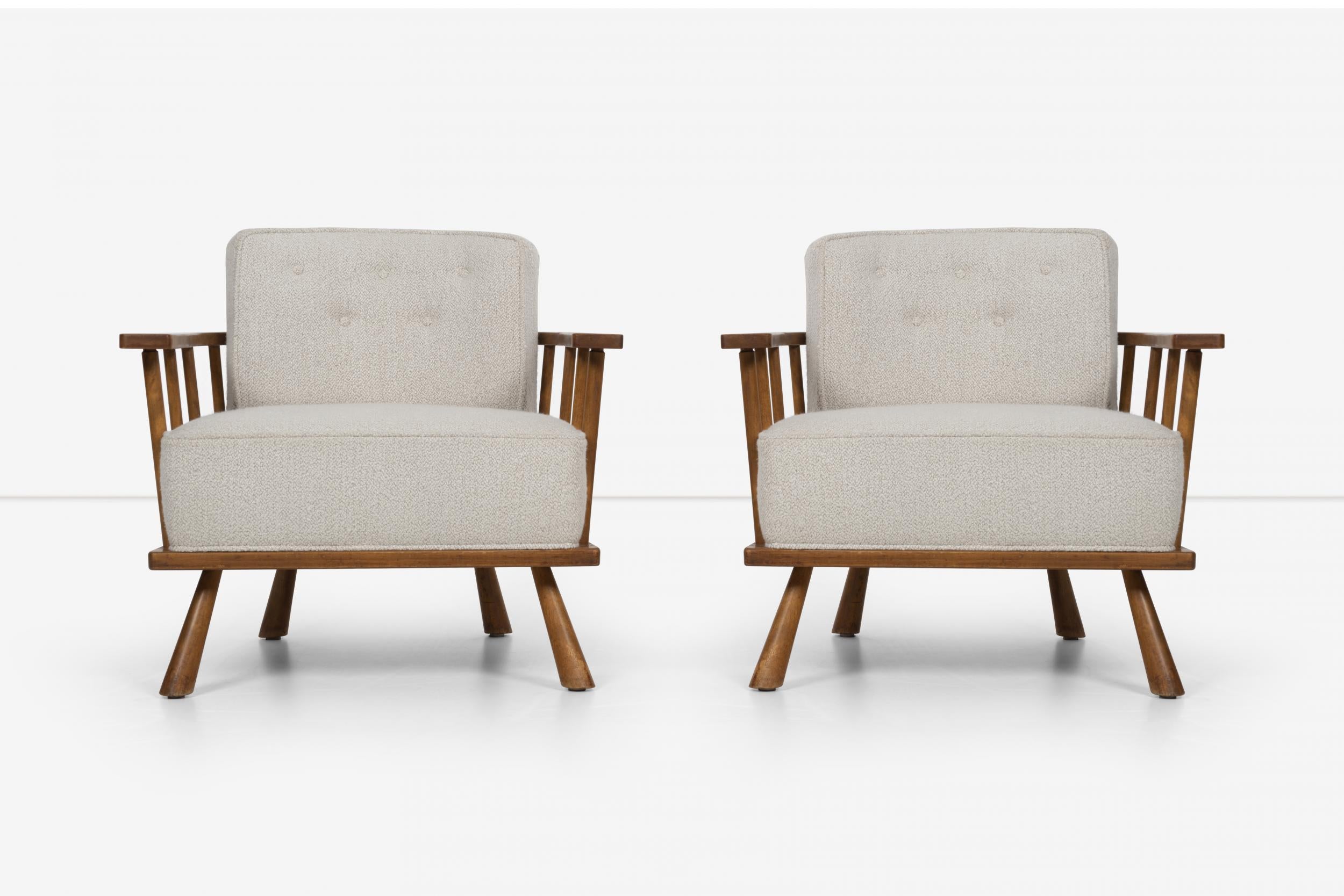 Pair of barrel back lounge chairs by Robsjohn-Gibbings, for Widdicomb, Model 1651. Frame made of solid maple spindles which secure boucle reupholstered button tufted tubs, with solid legs.