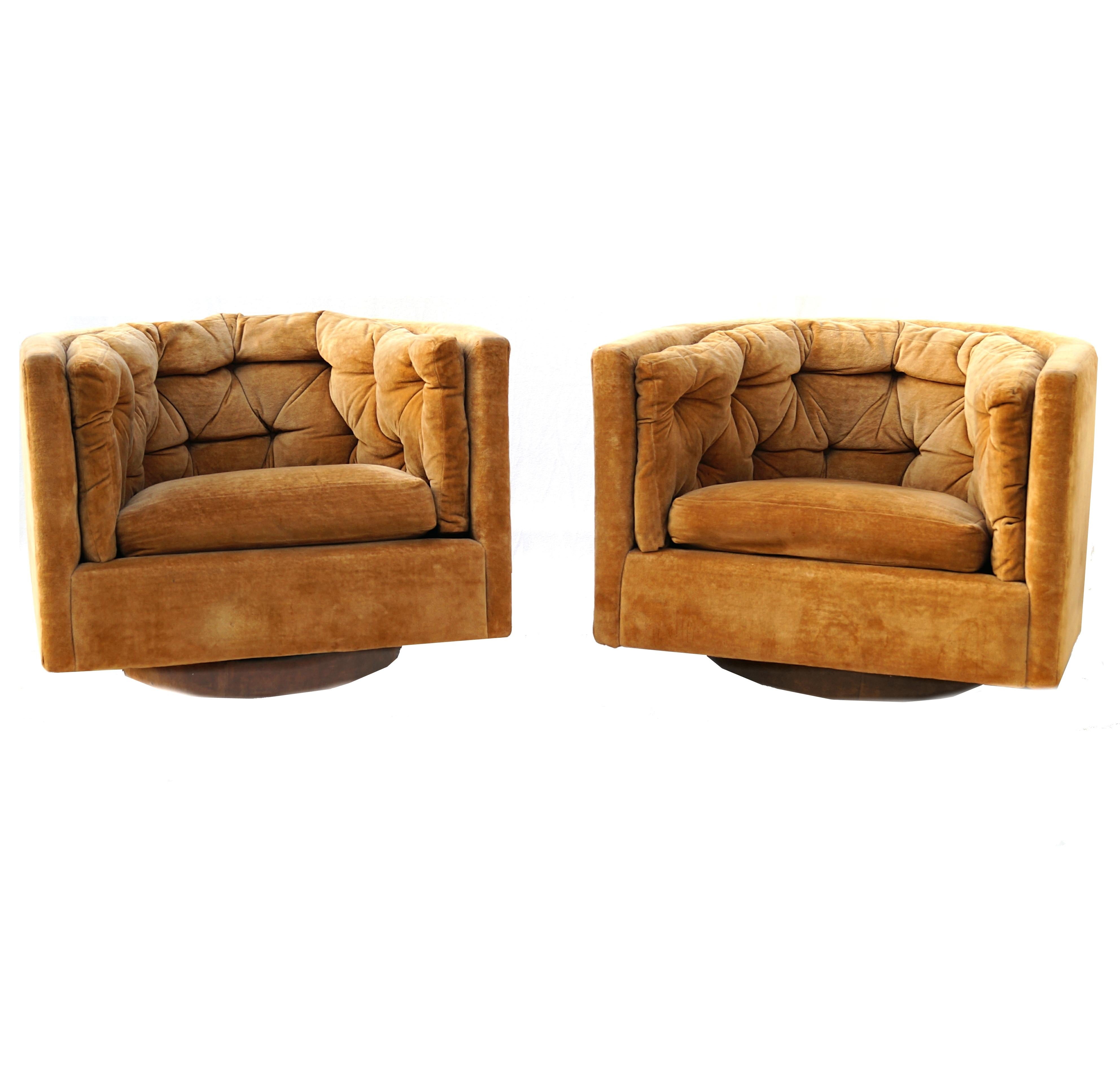 Pair of Barrel swivel chairs in the manner of Milo Baughman.