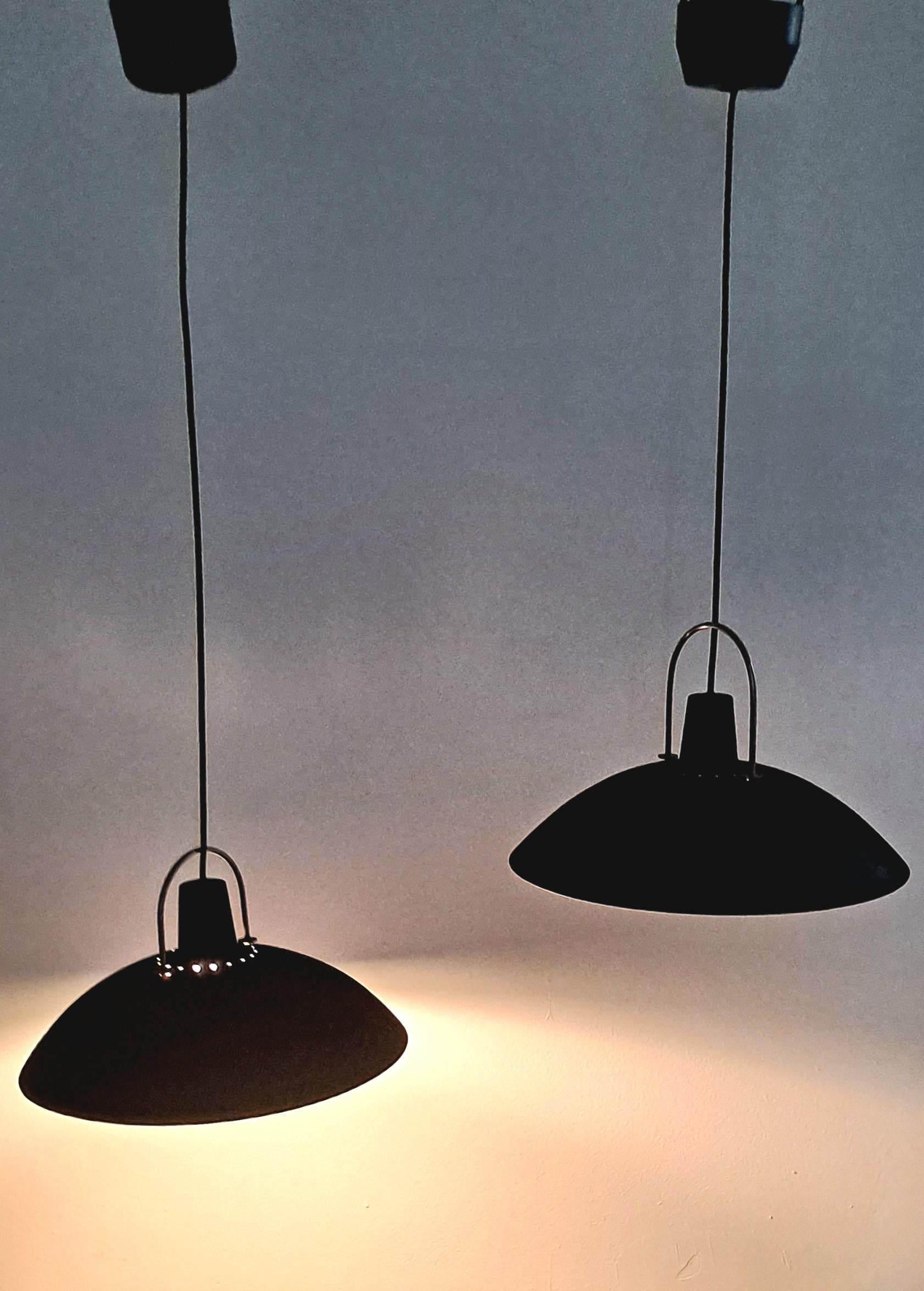 Bauhaus pendants design and made in the Bauhaus school in Germany .We purchase it in Austria .The Pendants are typically futures a simple,geometric shape often used in modern and contemporary design setting particularly in minimalist and industrial