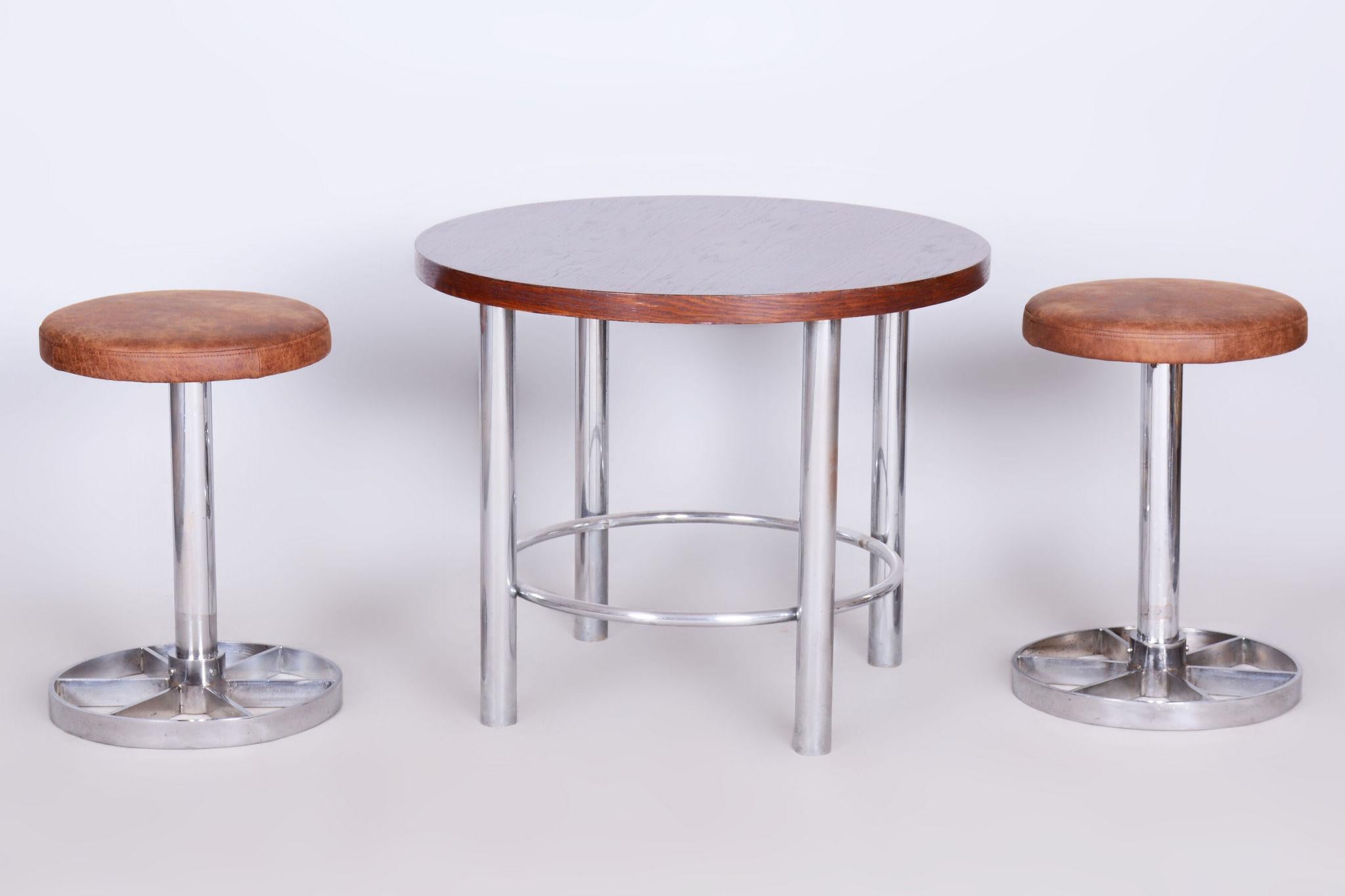 1930-1939
Origin: Czech

Pair of chrome-plated steel stools. 

The new upholstery is high quality leather, it's very easy to clean and retains its colours very well even in direct sunlight. 		

The chrome parts have been cleaned and professionally