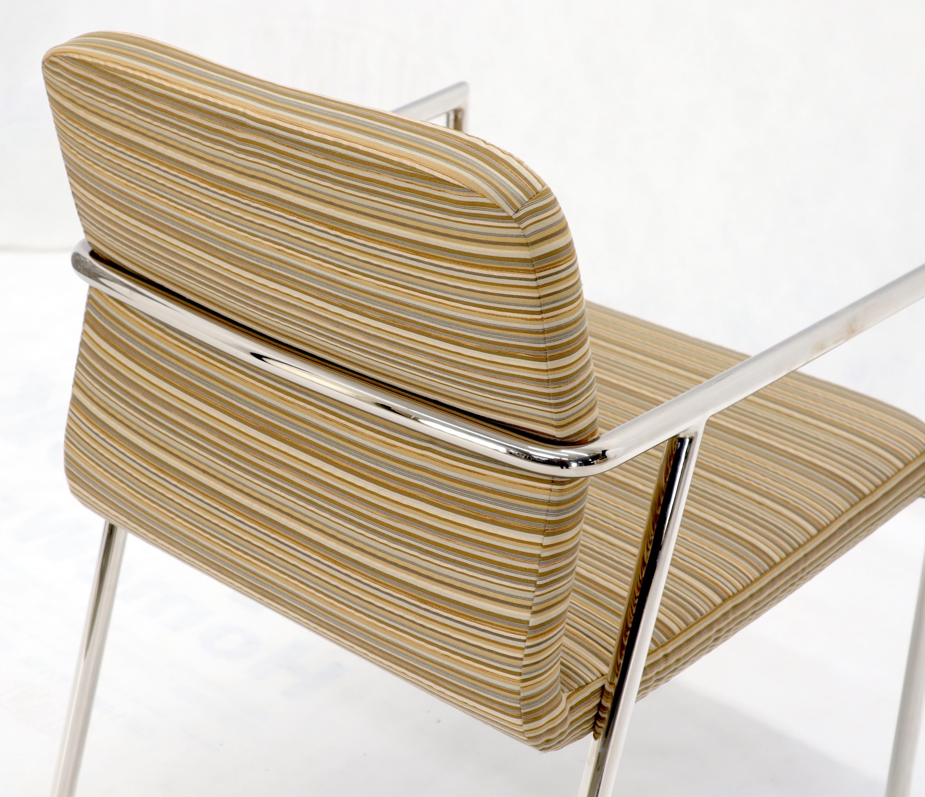 Pair of sharp looking stripe upholstery side office lounge chairs on chrome frame in style of Bauhaus.