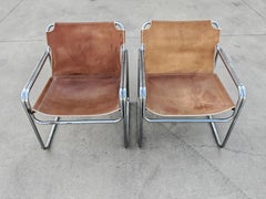 Coppia di sedie da salotto tubolari in stile Bauhaus in pelle color cognac, Jox Interni anni '70