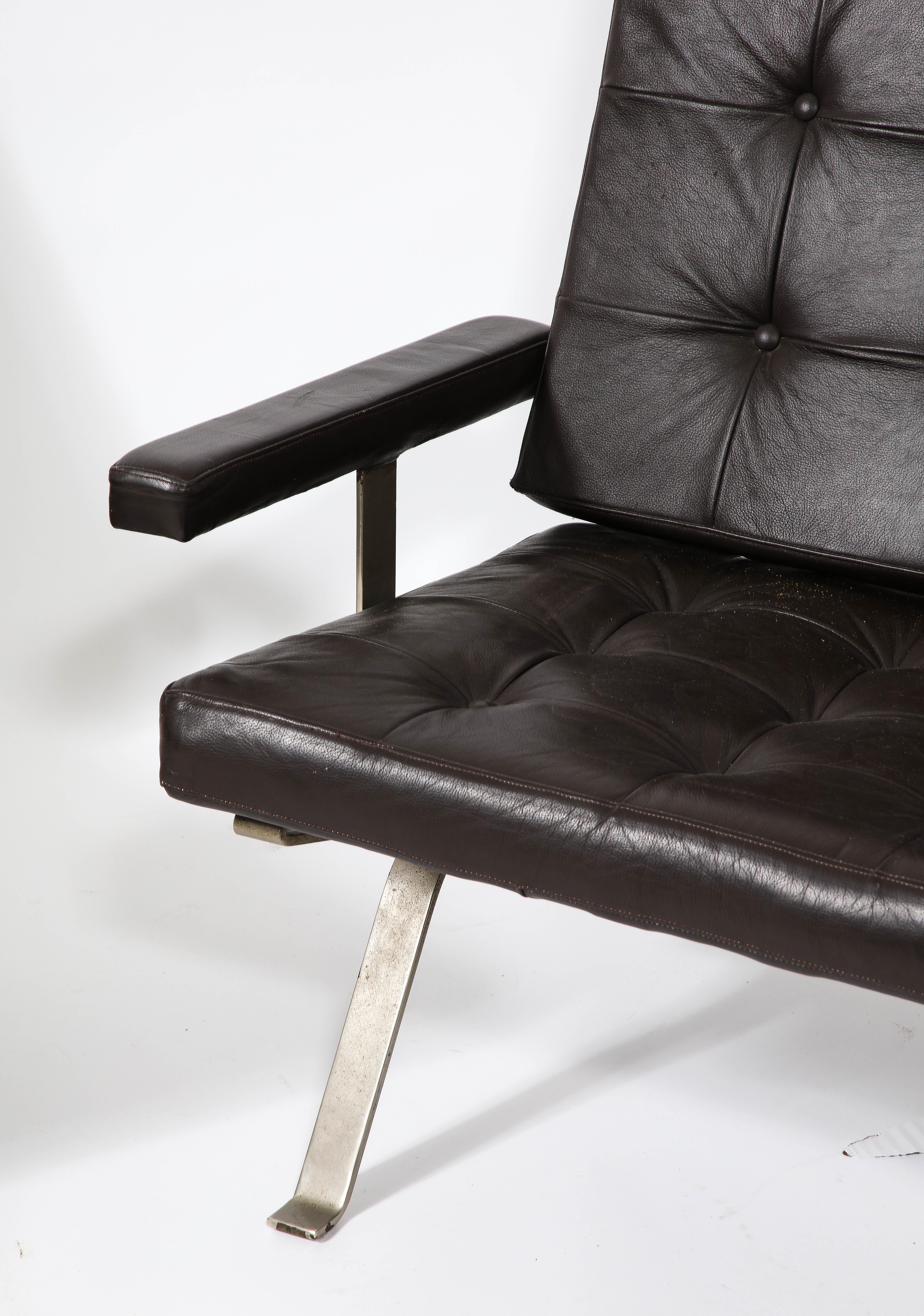 Elegant classic modernist chair. Reminiscent of Mies van der Rohe's Barcelona chair. In original leather upholstery. Ergonomic sit. 

Seat depth is 18