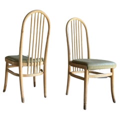 Pair of Baumann bistro chairs, France