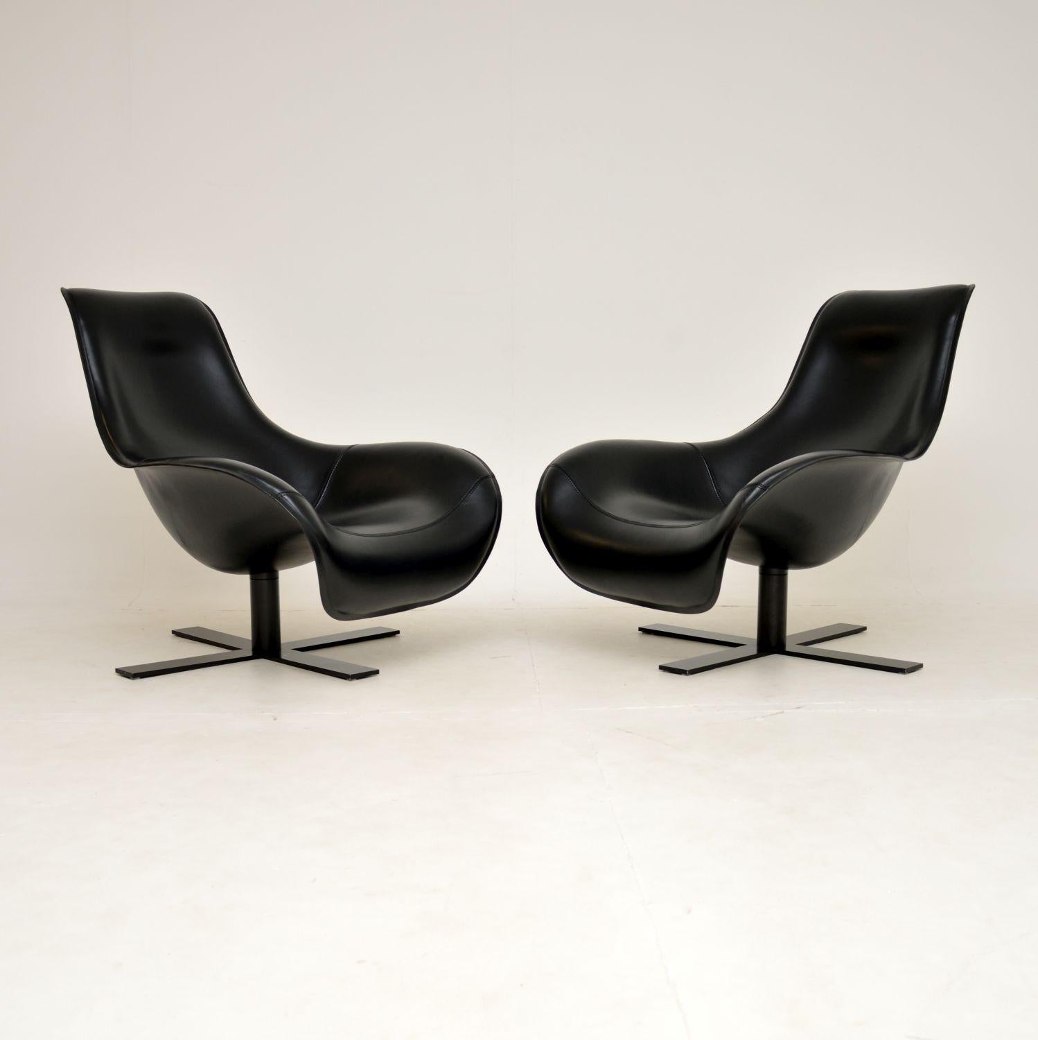 An outstanding pair of leather swivel armchairs by acclaimed designer Antonio Citterio for B&B Italia. They were designed in the early 21st century and this pair dates from 2006.

The quality is incredible, you will not see a more finely crafted