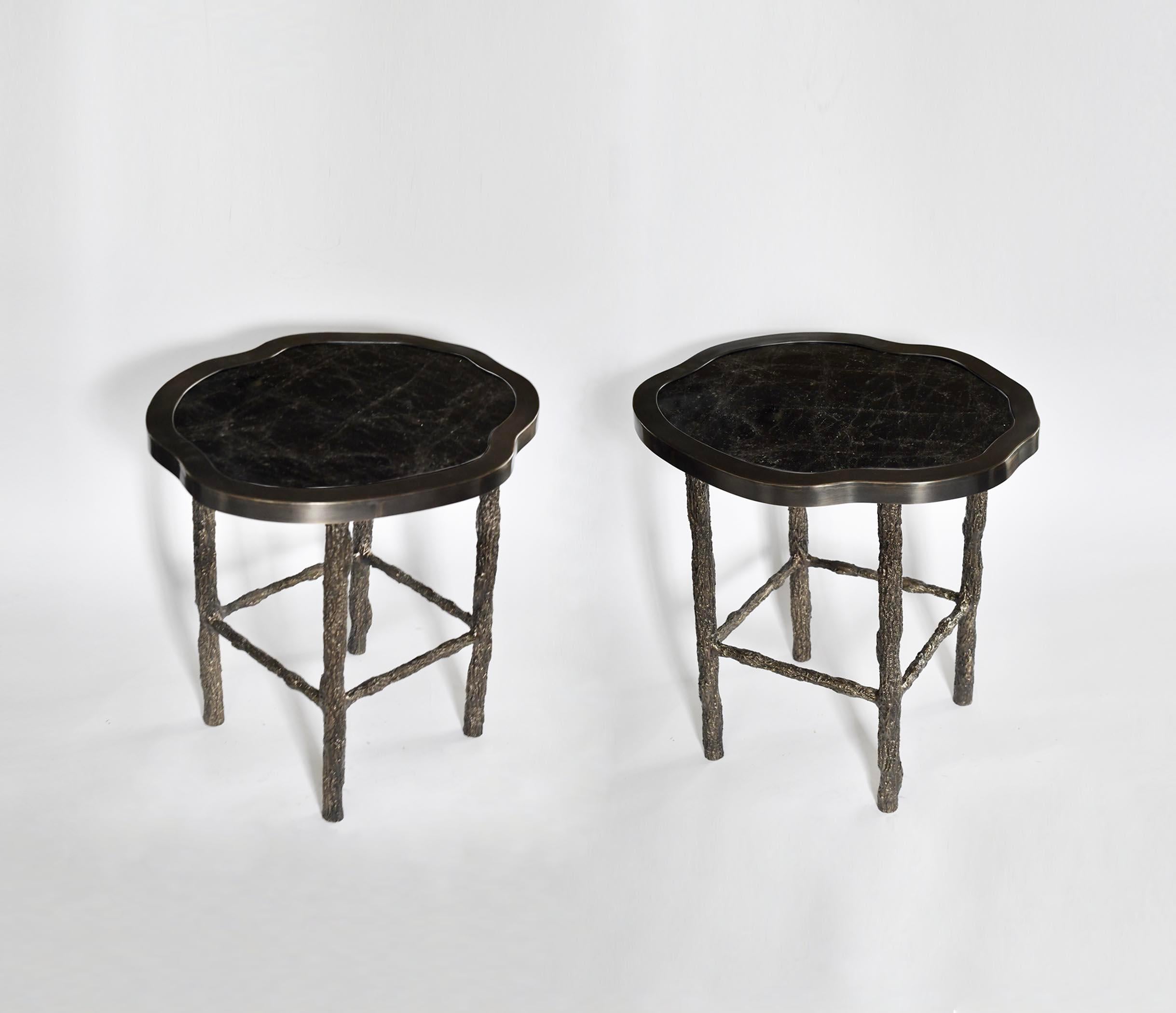 Pair of organic form smoky rock crystal top side table with hammered antique brass frames. The twig inspired bronze legs. Create by Phoenix Gallery.
Two in stock.
Custom size upon request.