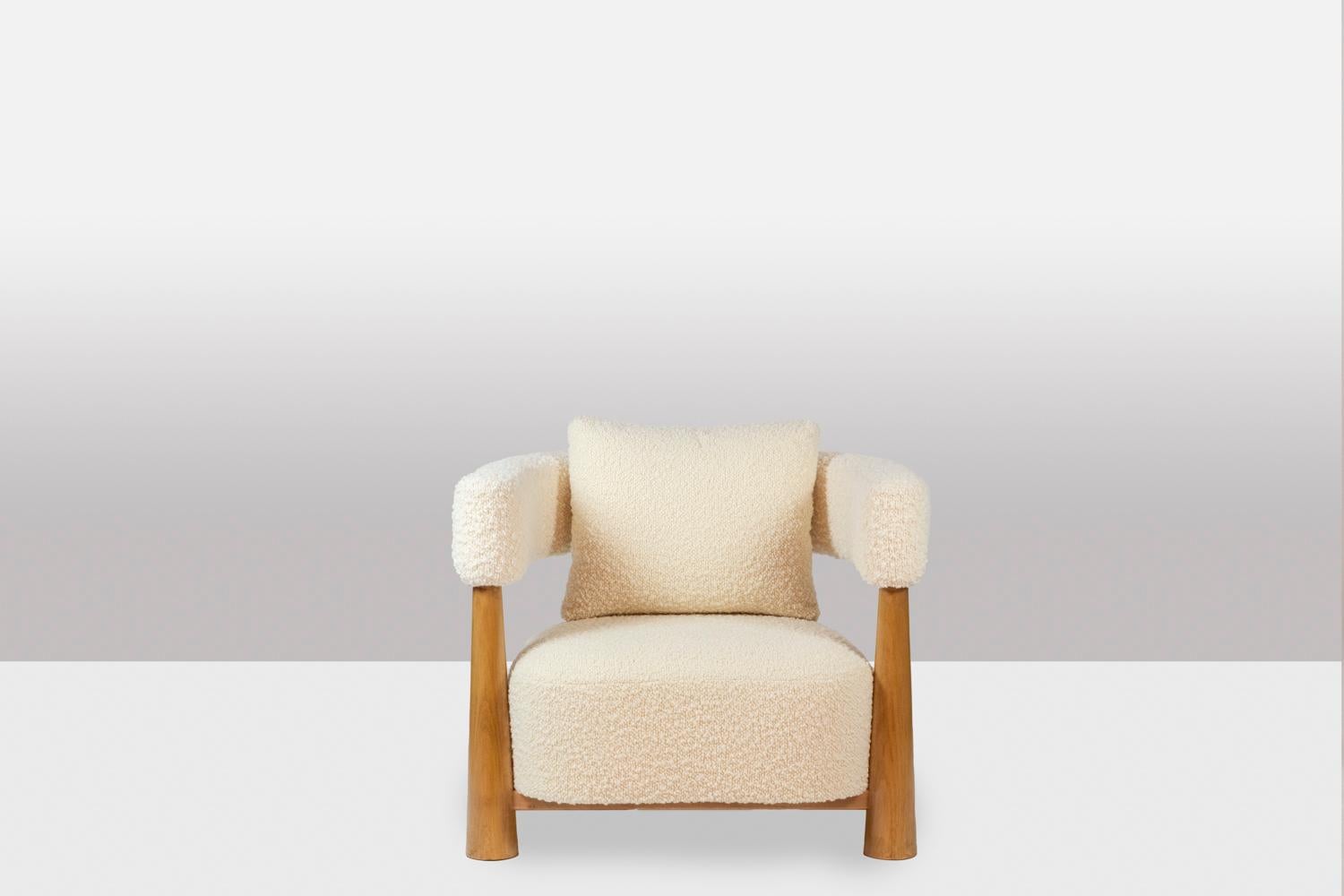 Beech Pair of “bean” shaped armchairs, in blond beech. Contemporary work. For Sale