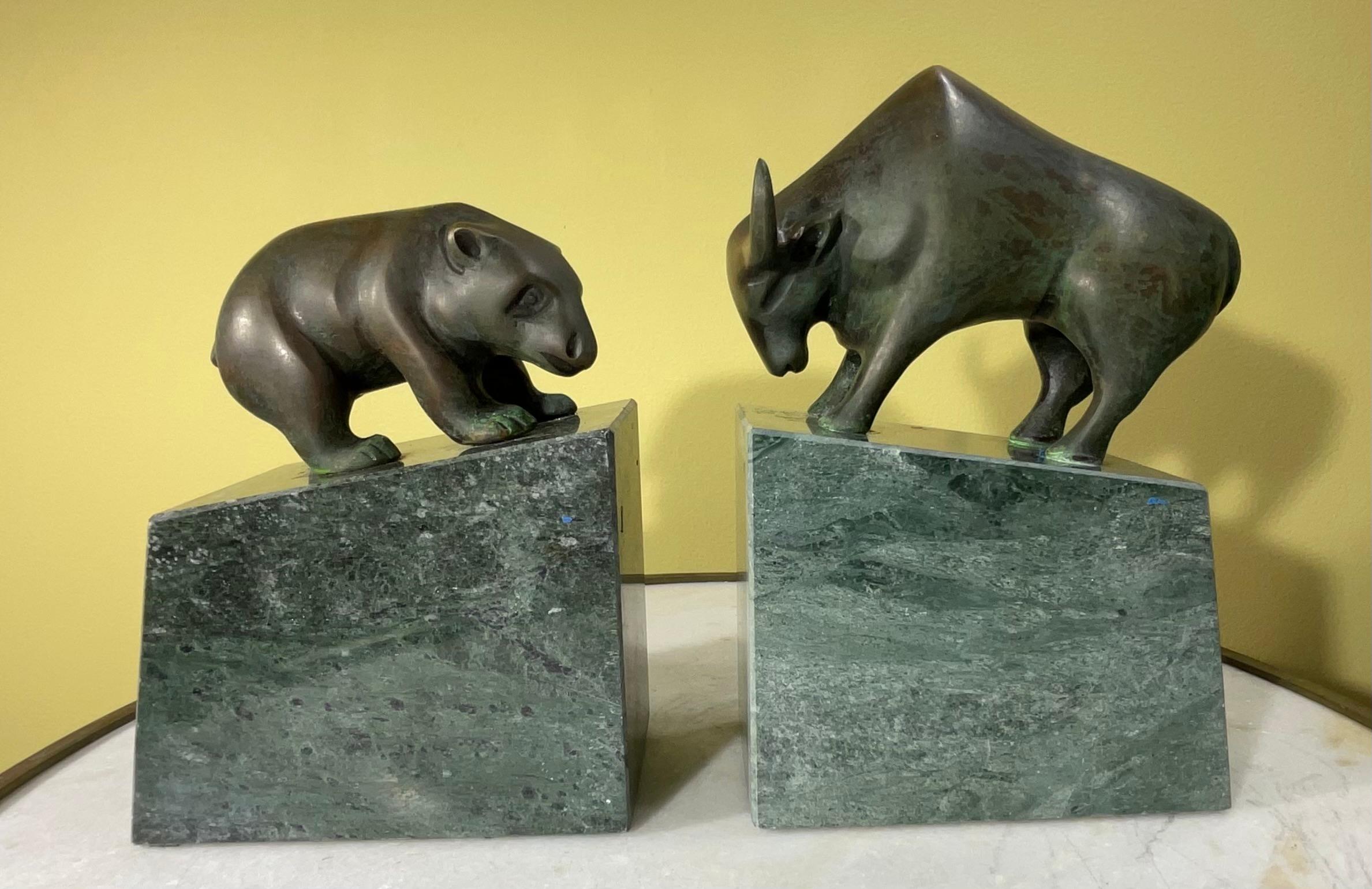 Fun pair of bull and bear bronze and green marble bookends, circa 1990s. The pair are in good condition the bull and the bear. The green marble is in Great gift for any Wall Street trader, stock broker , or day trader.
Sizes :
5”.5 x 3” x7”.5 h
5” x