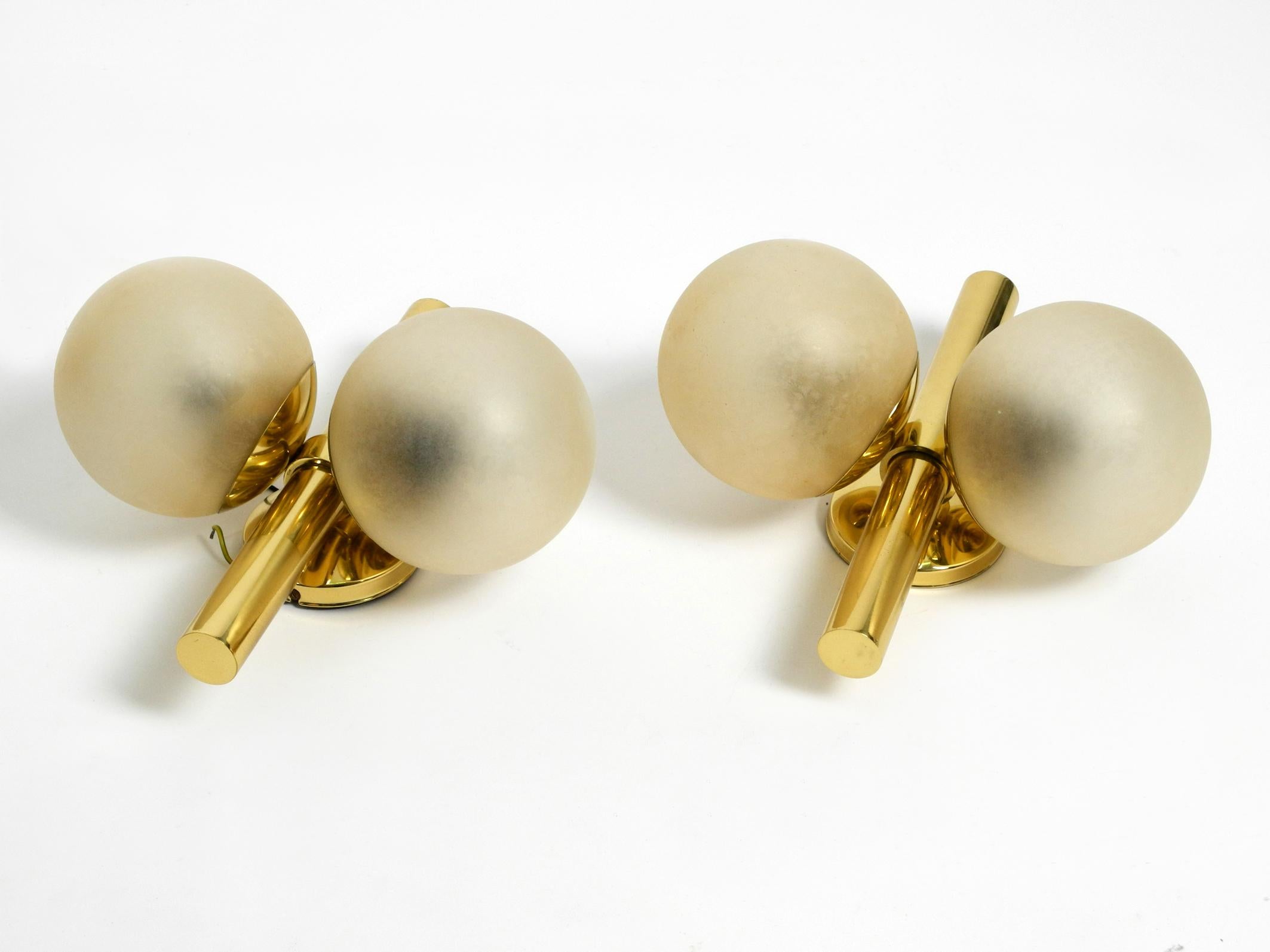 Space Age Pair of Beautiful 1960s Kaiser Brass Wall Lamps with Two Golden Glass Spheres For Sale