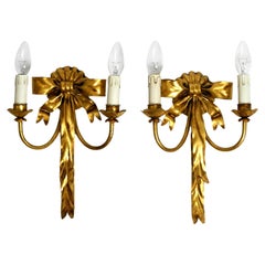 Pair of beautiful 1970s gold-plated metal wall lamps with large ribbons