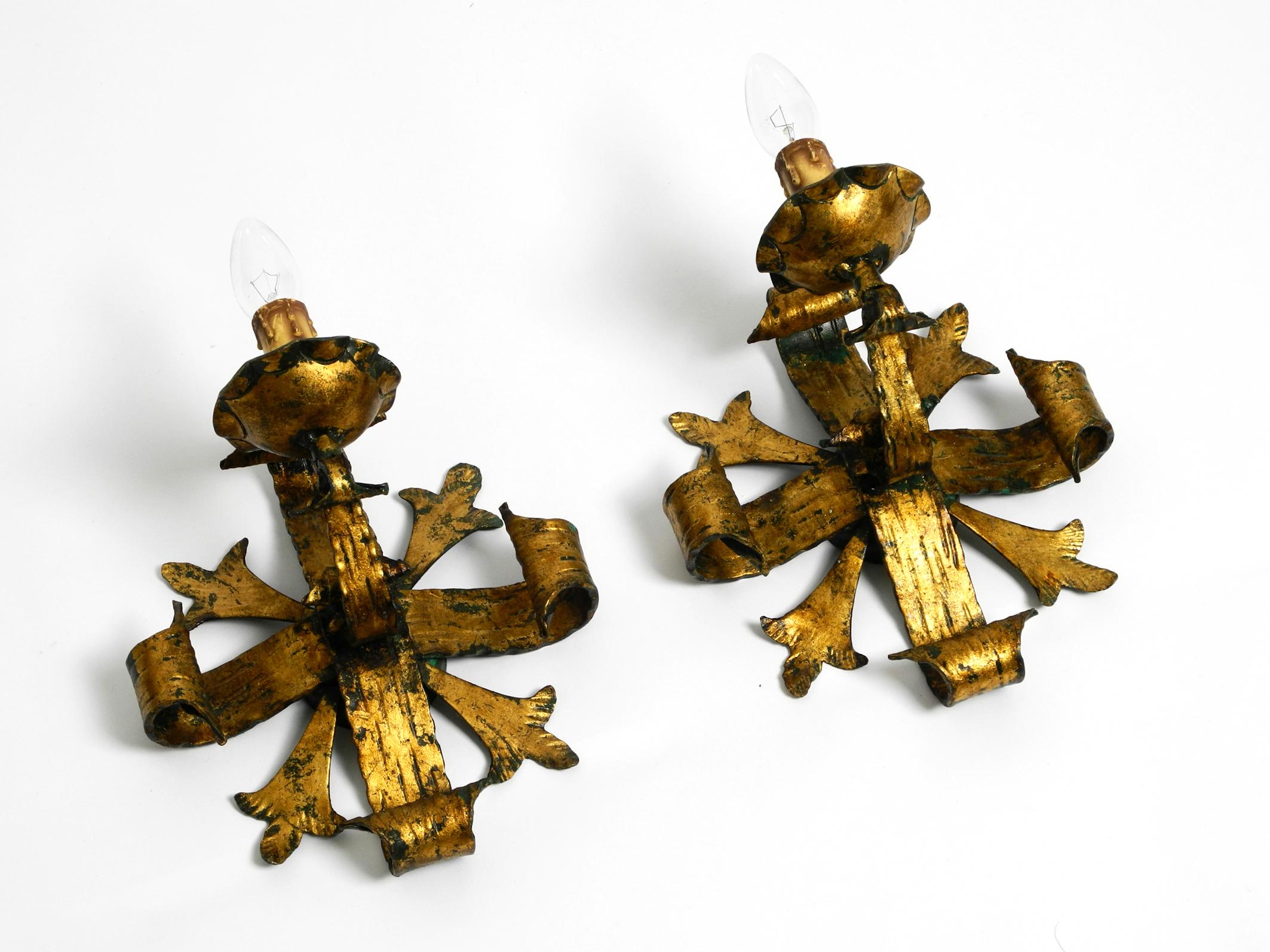 Mid-Century Modern Pair of beautiful heavy 1960s gilded iron wall lamps in Brutalist design For Sale