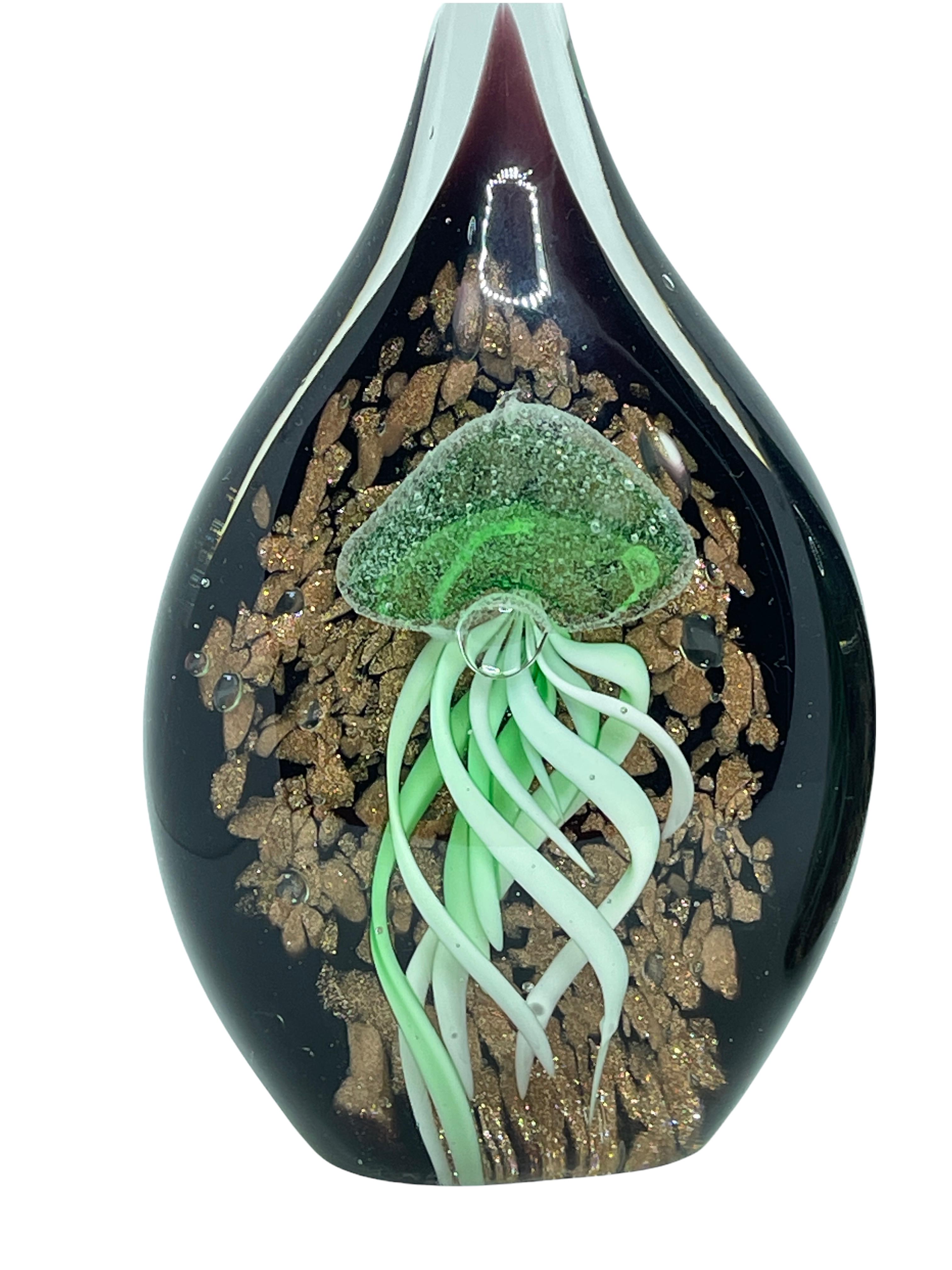 Beautiful Murano hand blown aquarium Italian art glass Statue or paperweight. Each Showing a jelly fish, underwater floating on controlled bubbles. Colors are a black, green and clear. A beautiful nice addition to your desktop or as a decorative