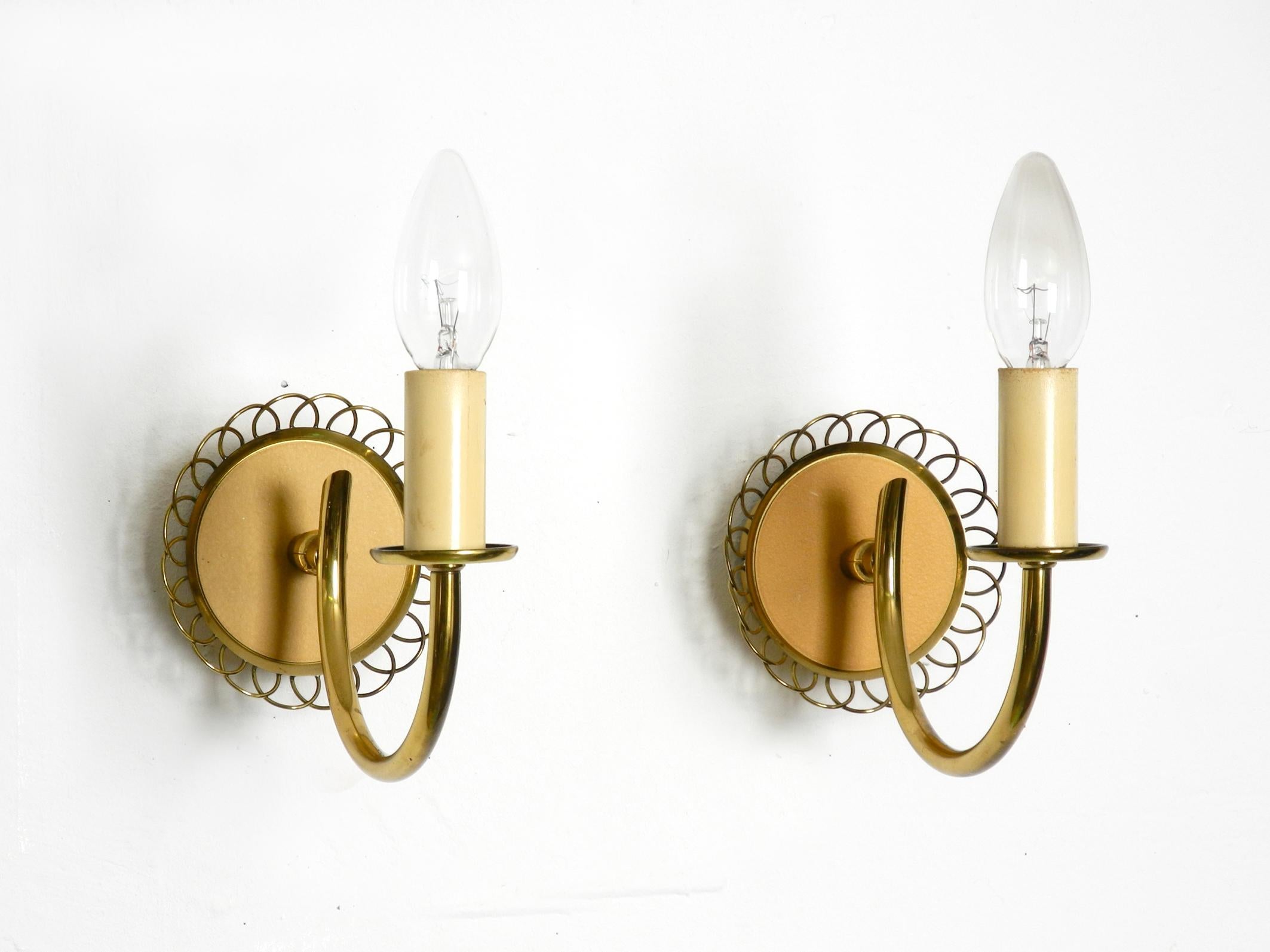Pair of beautiful mid century brass wall lamps from Vereinigte Werkstätten 9
