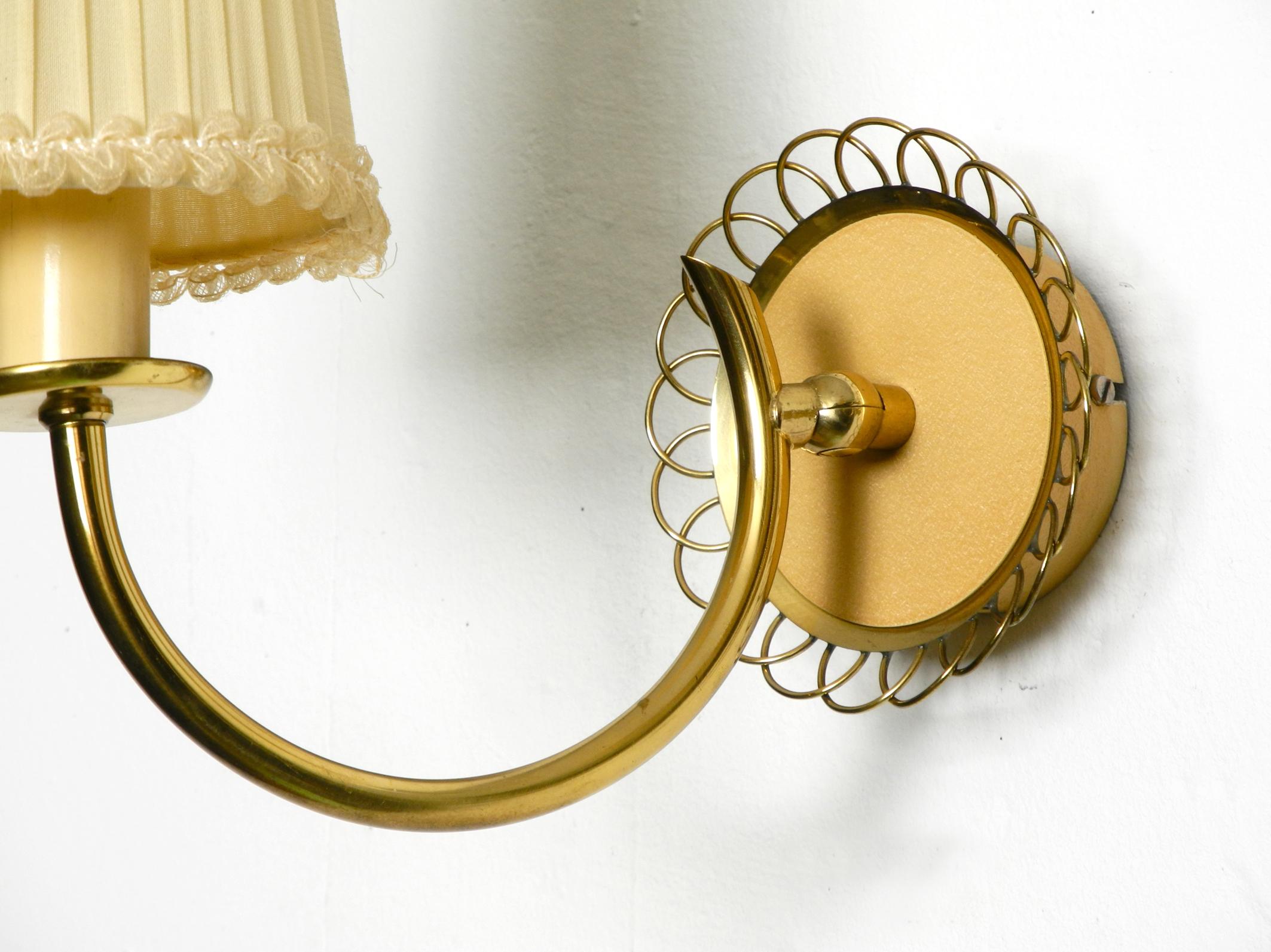 Pair of beautiful mid century brass wall lamps from Vereinigte Werkstätten 11