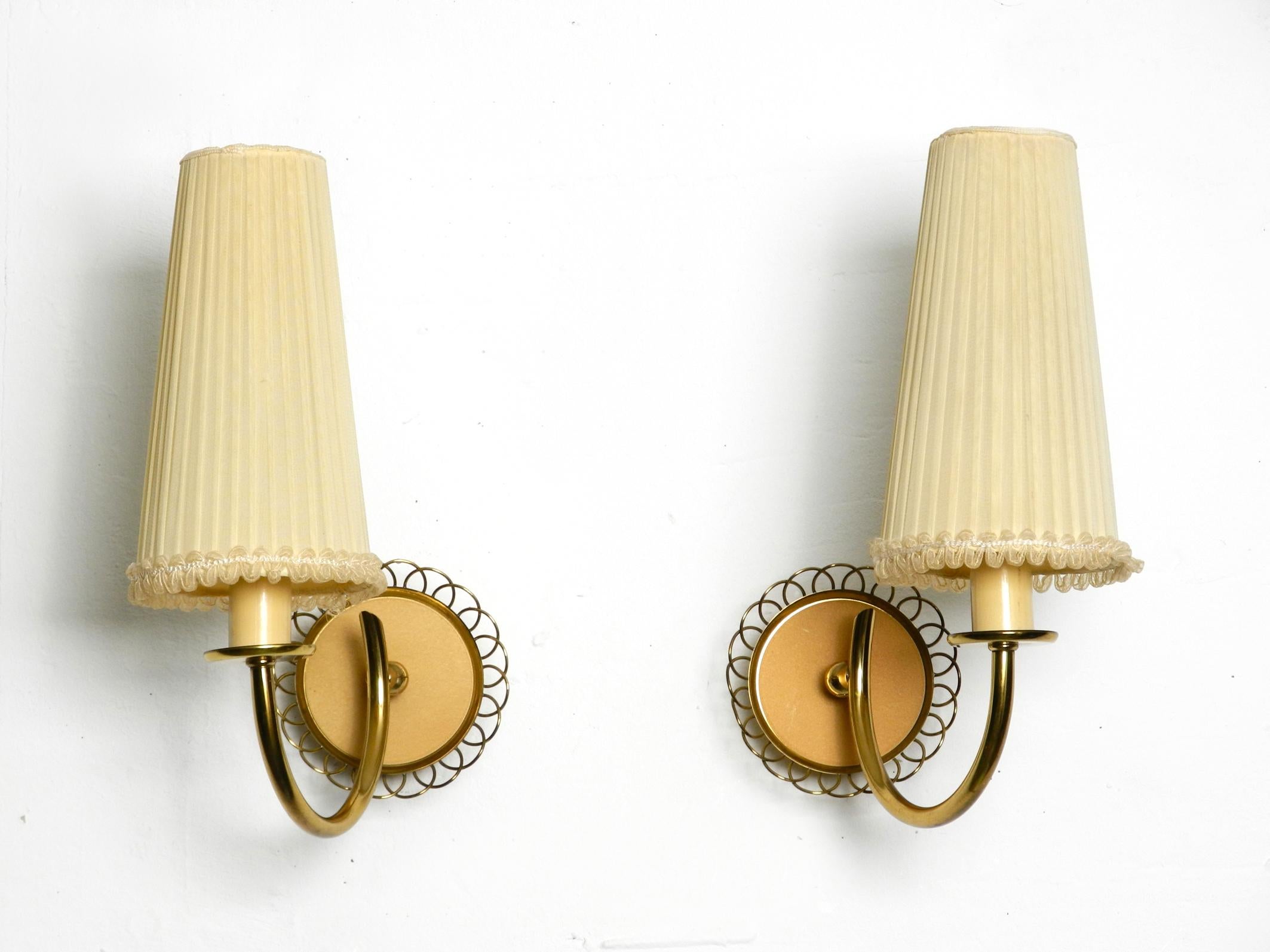 Mid-Century Modern Pair of beautiful mid century brass wall lamps from Vereinigte Werkstätten