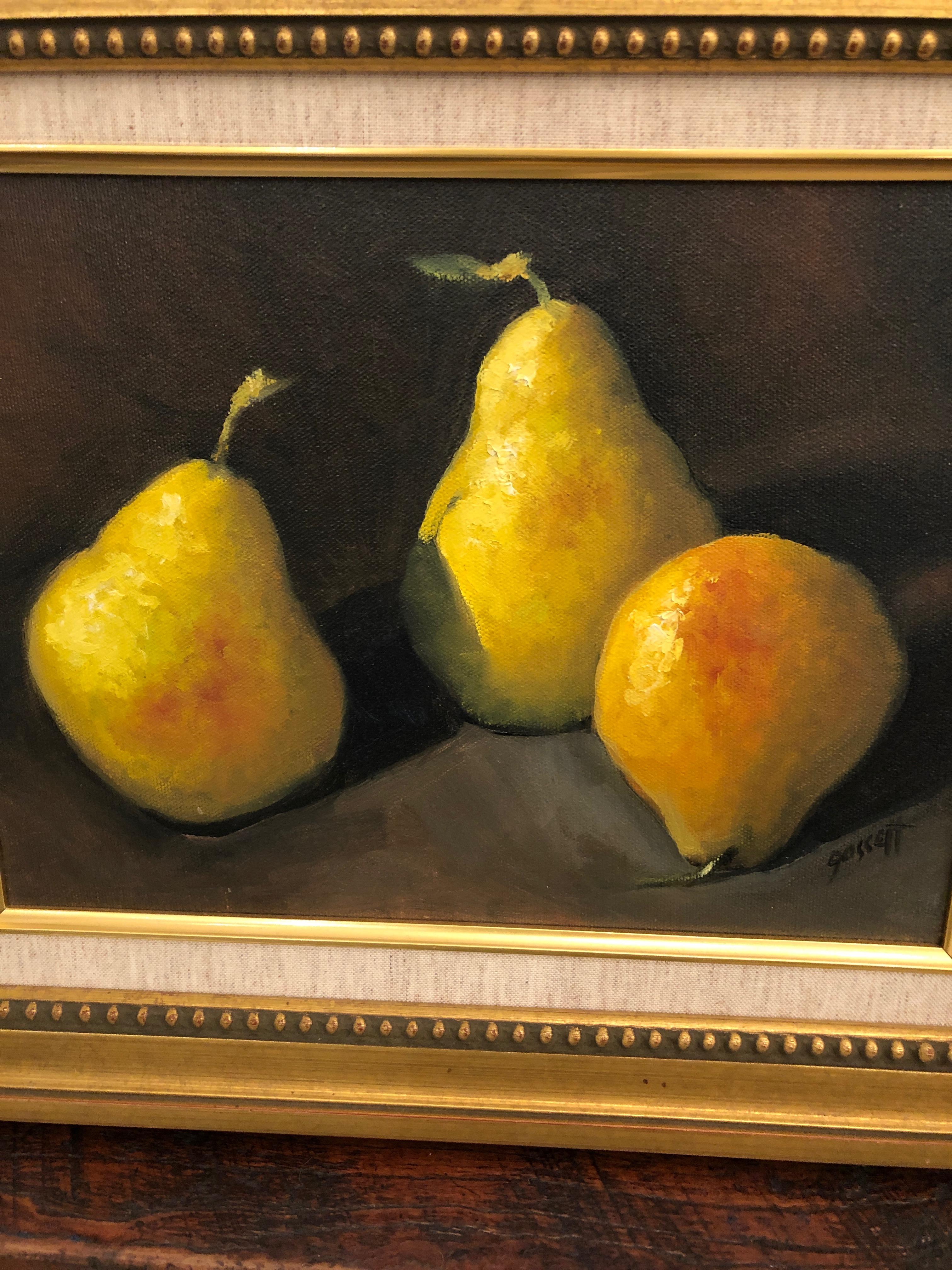 Two beautifully rendered realistic still life paintings on canvas of lime green pears against a black background, elegantly framed with linen matts and giltwood moldings. Signed Gossett lower right
canvas 11.5 W x 8.5 H.
