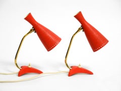 Pair of beautiful red Mid Century Diabolo crow's foot table lamps from Cosack