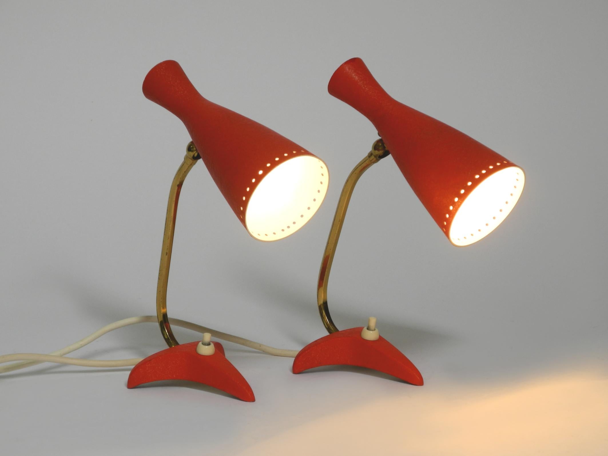 German Pair of beautiful red Mid Century Diabolo crow's foot table lamps from Cosack For Sale