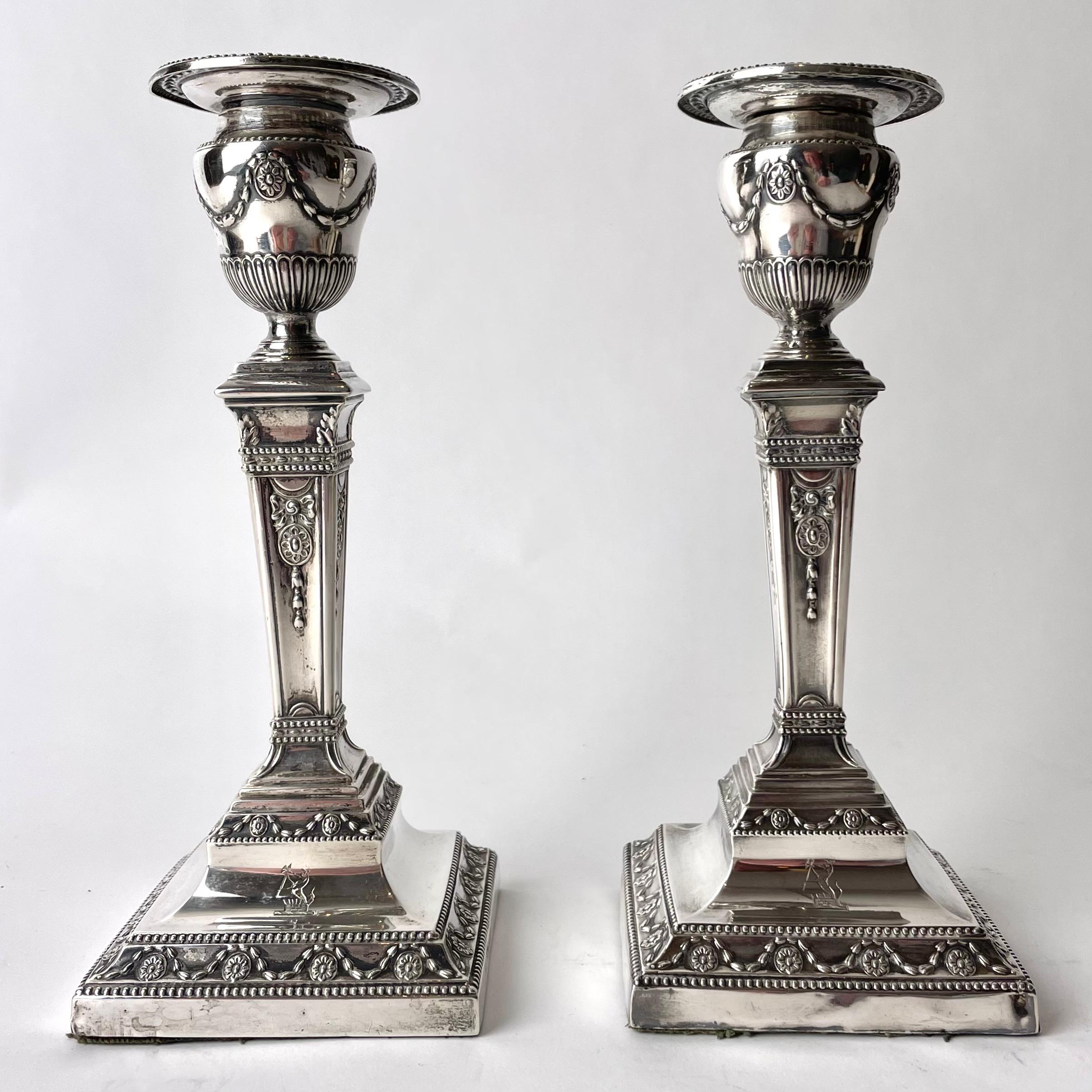 Pair of beautiful Silver Candlesticks hallmarked JB, London 1881. Minor dents at the bottom (see pictures) but rhe candlesticks are over 140 years old and the overall condition is good.

Wear consistent with age and use 